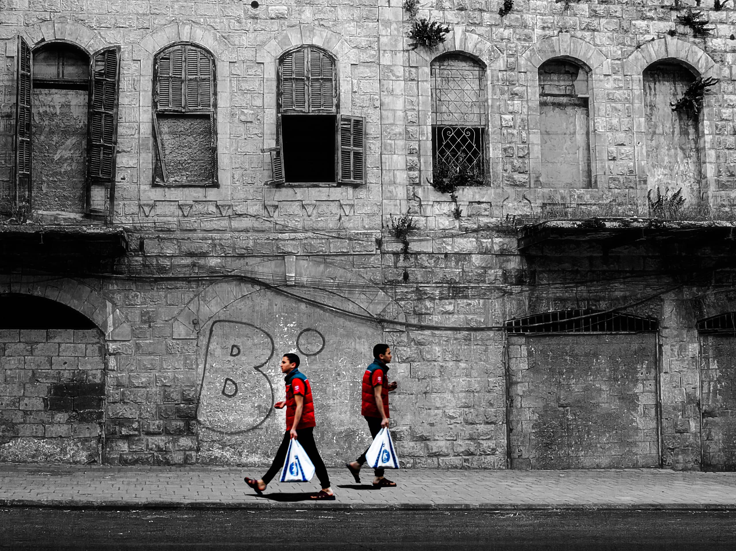 People Amman City Center MAN Walk Black AND, a fine-art photograph by Ali Abu Ras