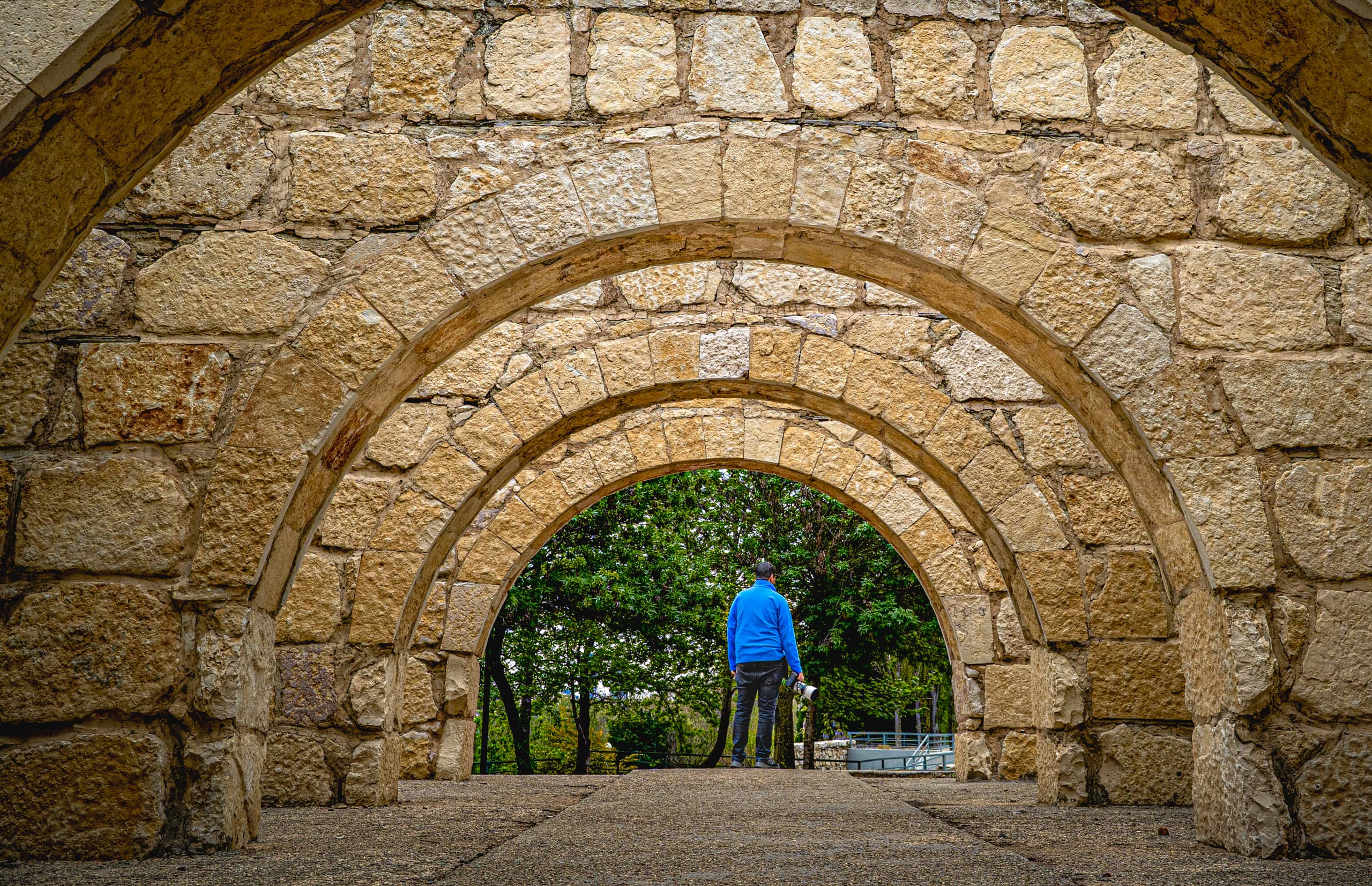 MAN Stand Arches, a fine-art photograph by Ali Abu Ras