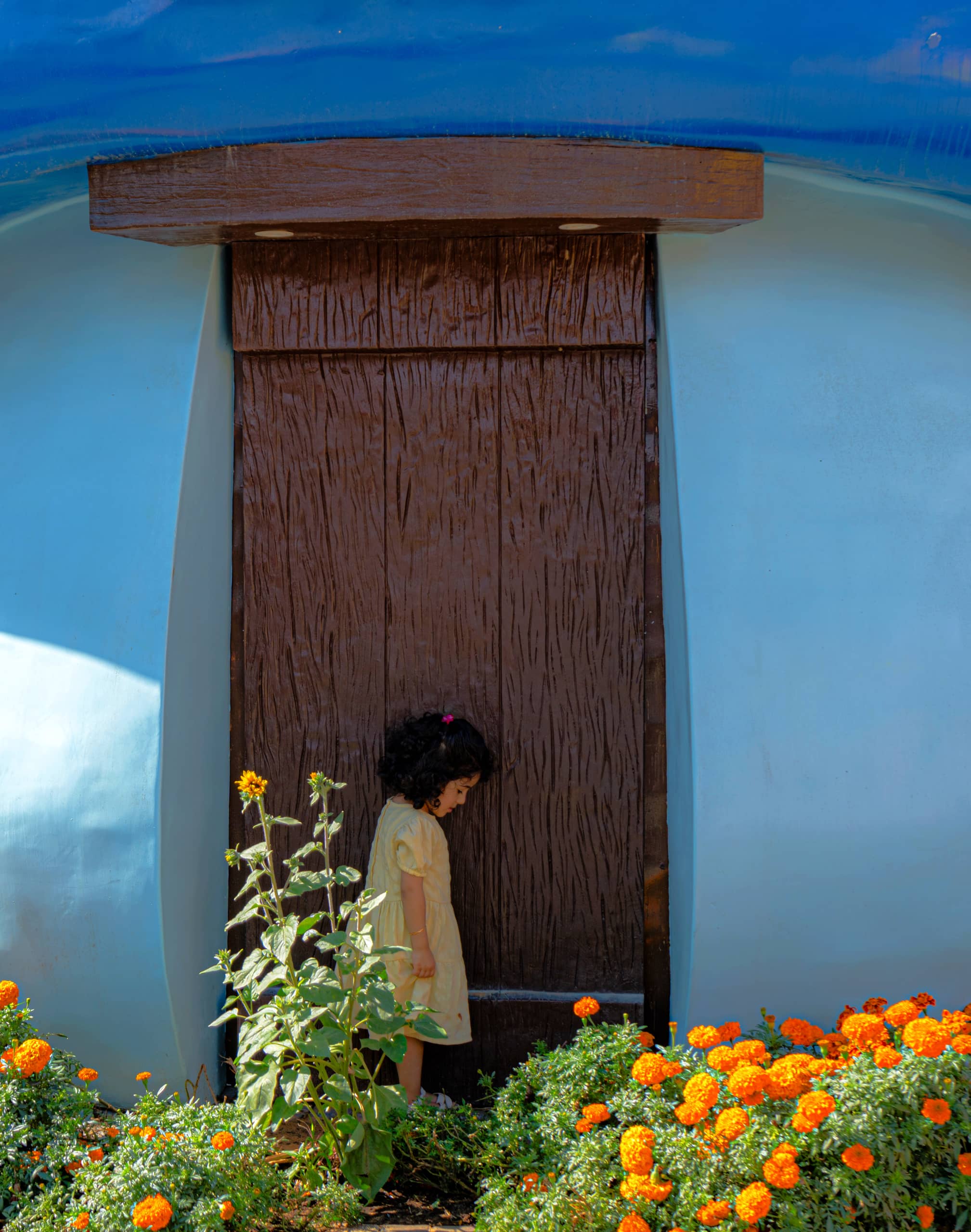 Dubai Flower Place Garden Girl, a fine-art photograph by Ali Abu Ras