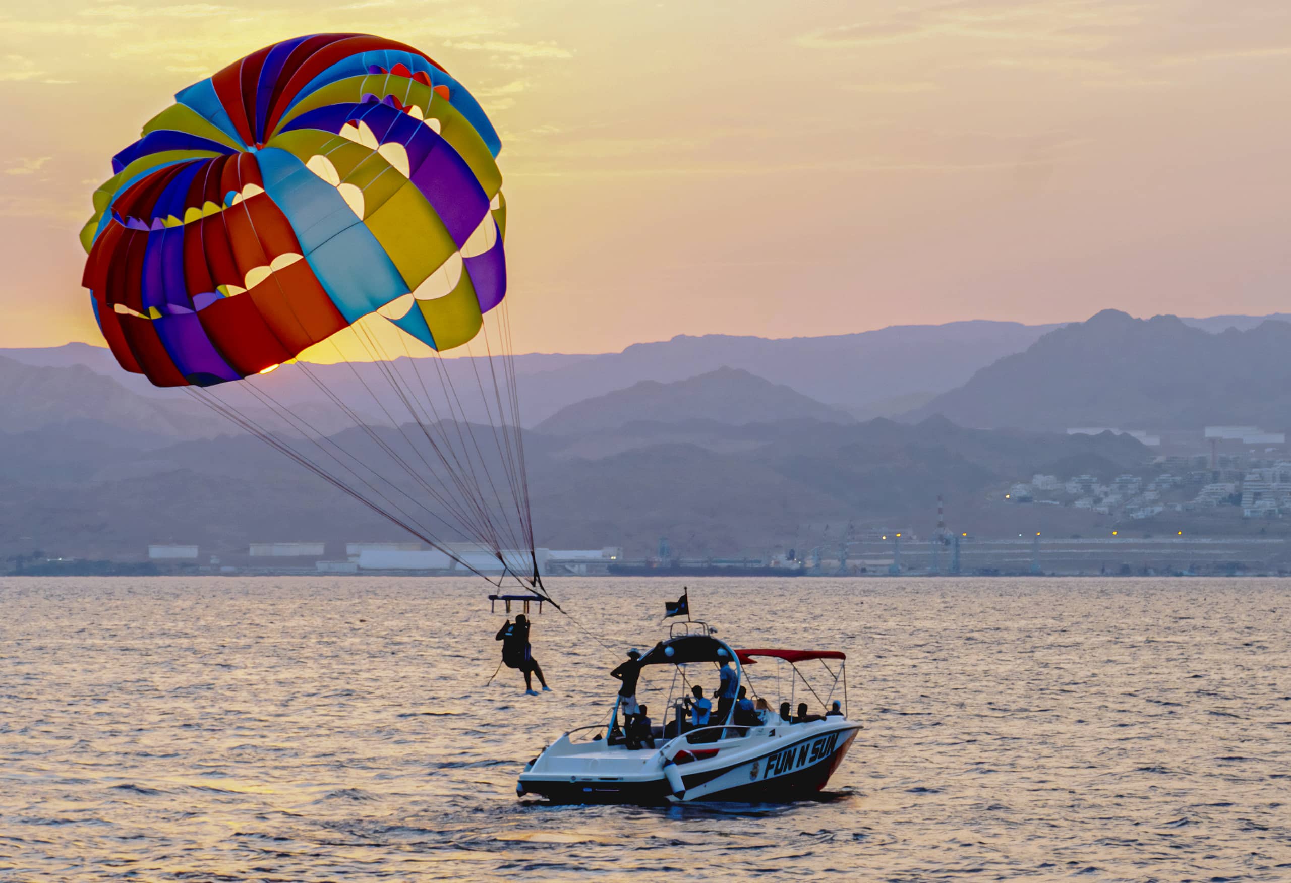 Aqaba Boot Brashot MAN Down SEA Sunset, a fine-art photograph by Ali Abu Ras