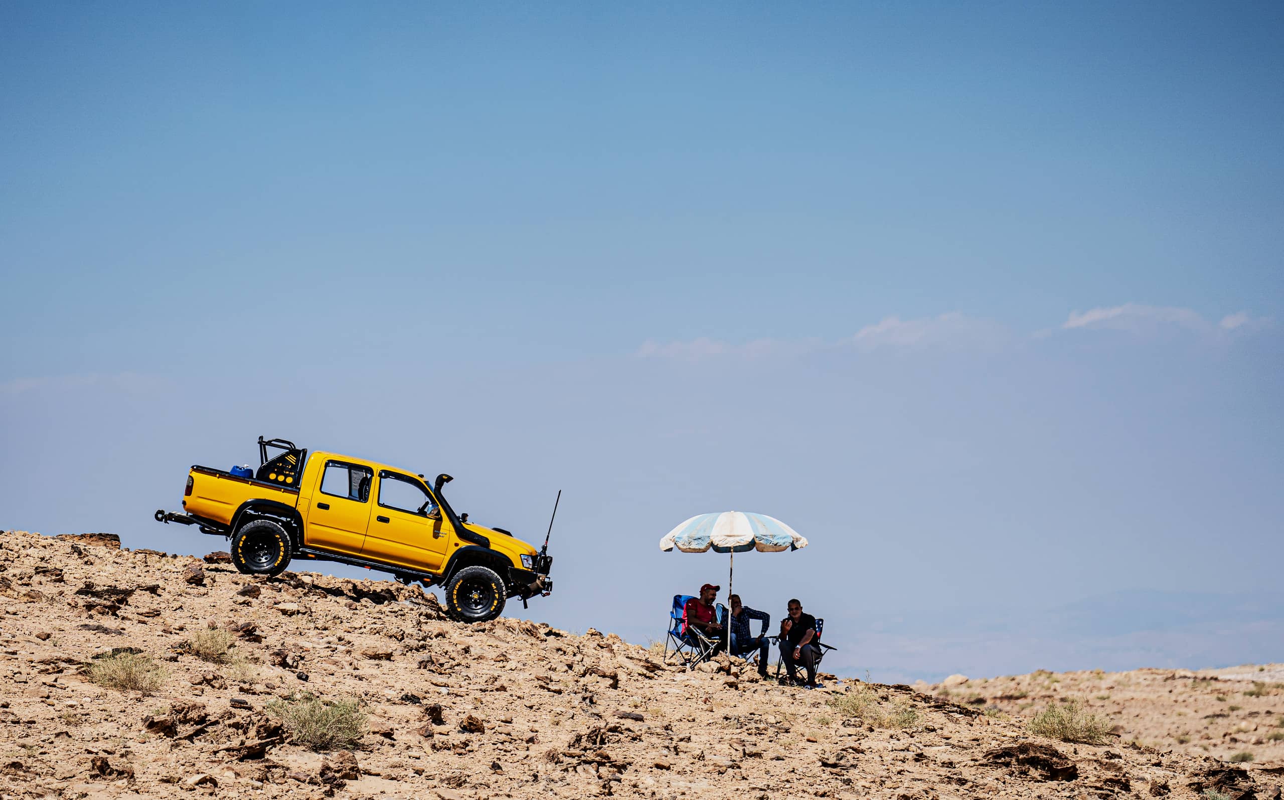 4 X 4 CAR RED Deadsea, a fine-art photograph by Ali Abu Ras