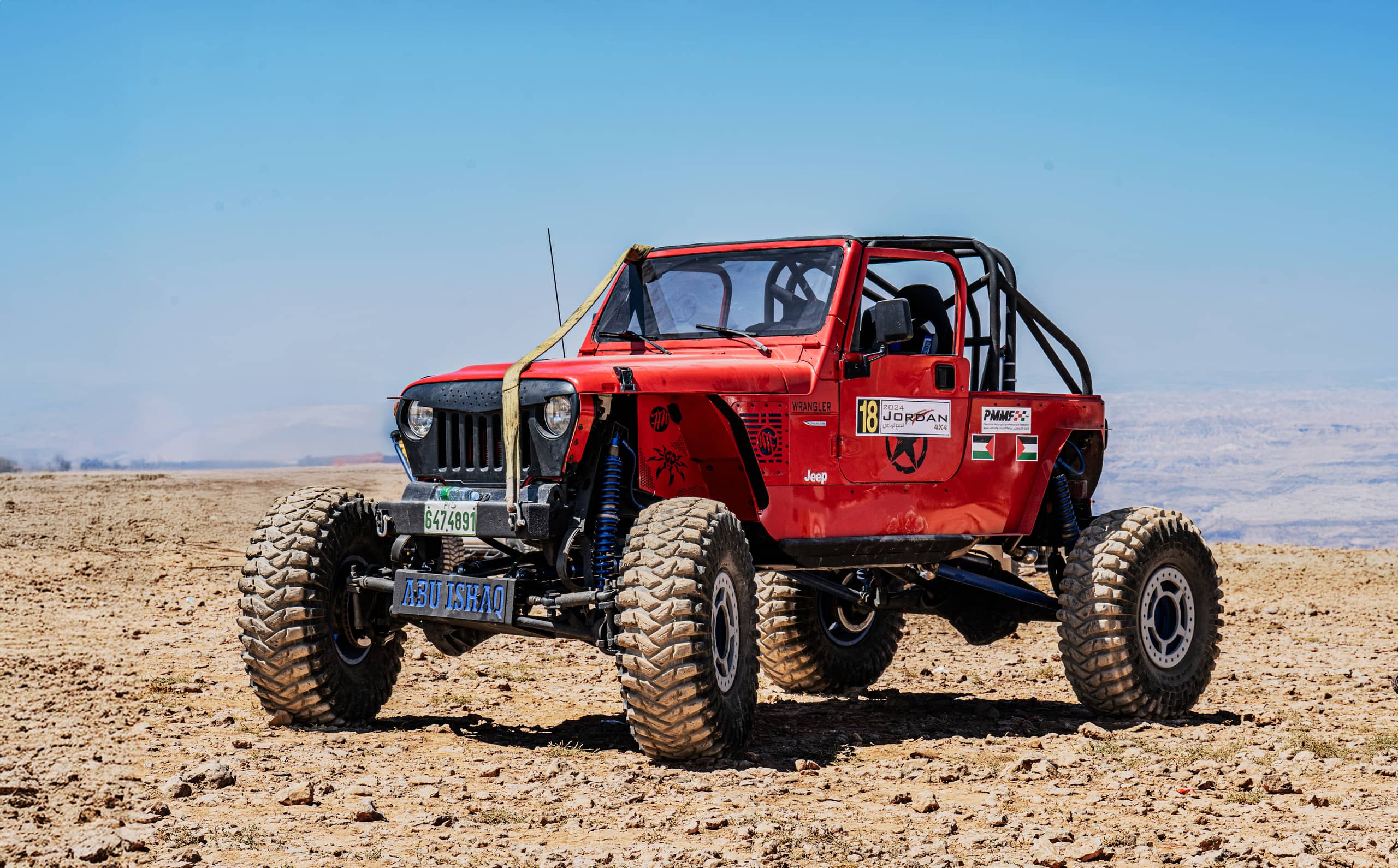 4 X 4 CAR RED Deadsea 0, a fine-art photograph by Ali Abu Ras