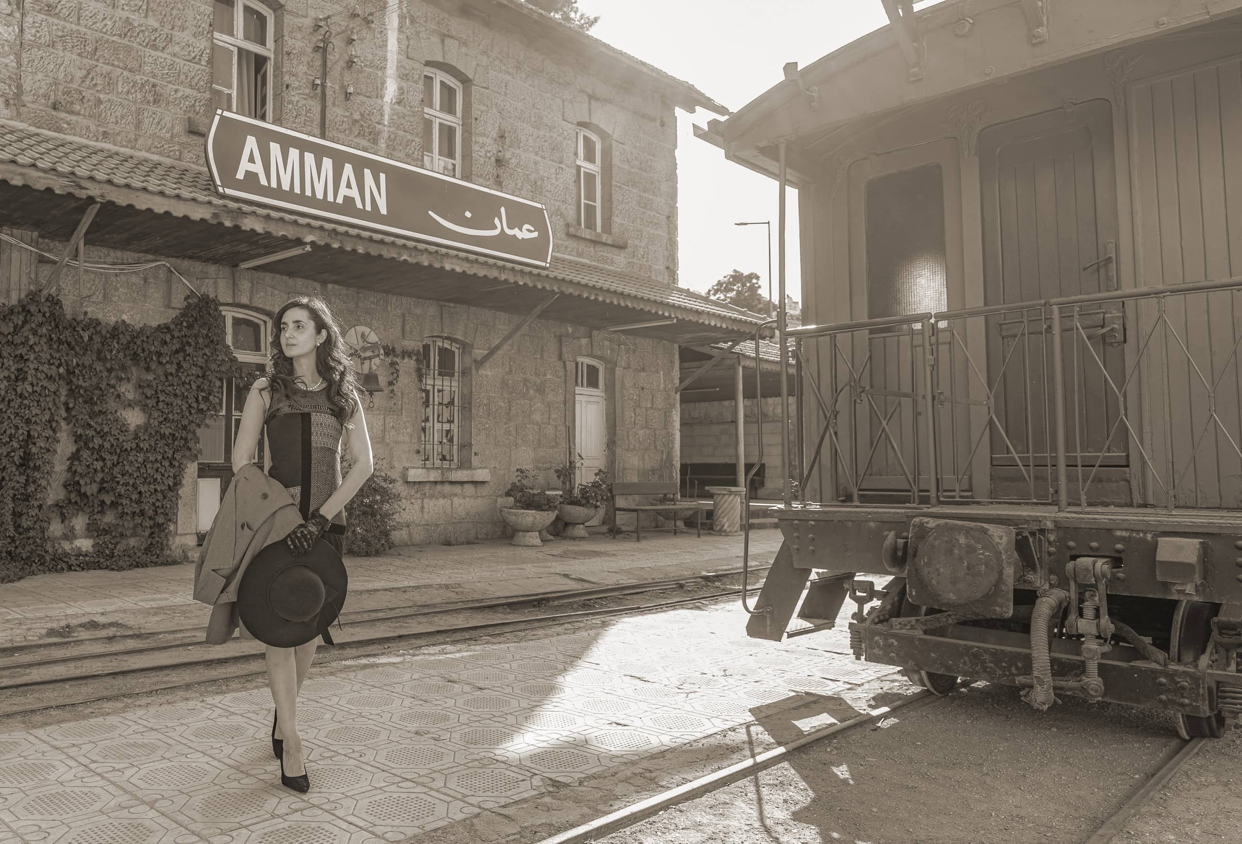 Noor RED Dress Train, a fine-art photograph by Ali Abu Ras