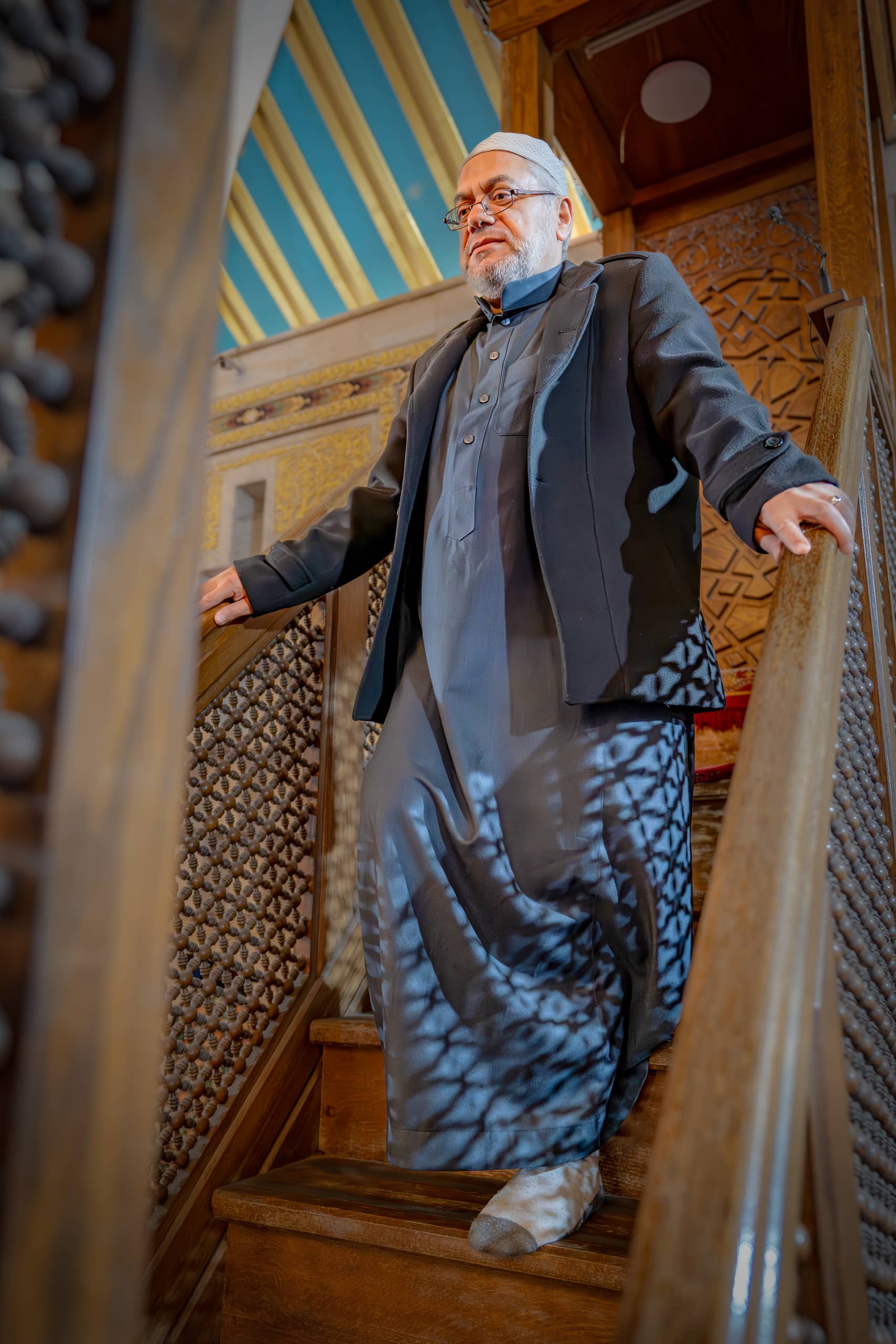 MAN OLD Masjed Pray, a fine-art photograph by Ali Abu Ras