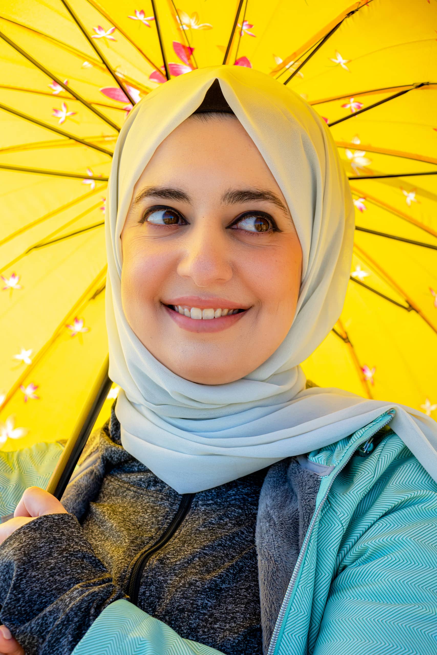 Woman Rola Potrait Face SUN Umbrela, a fine-art photograph by Ali Abu Ras