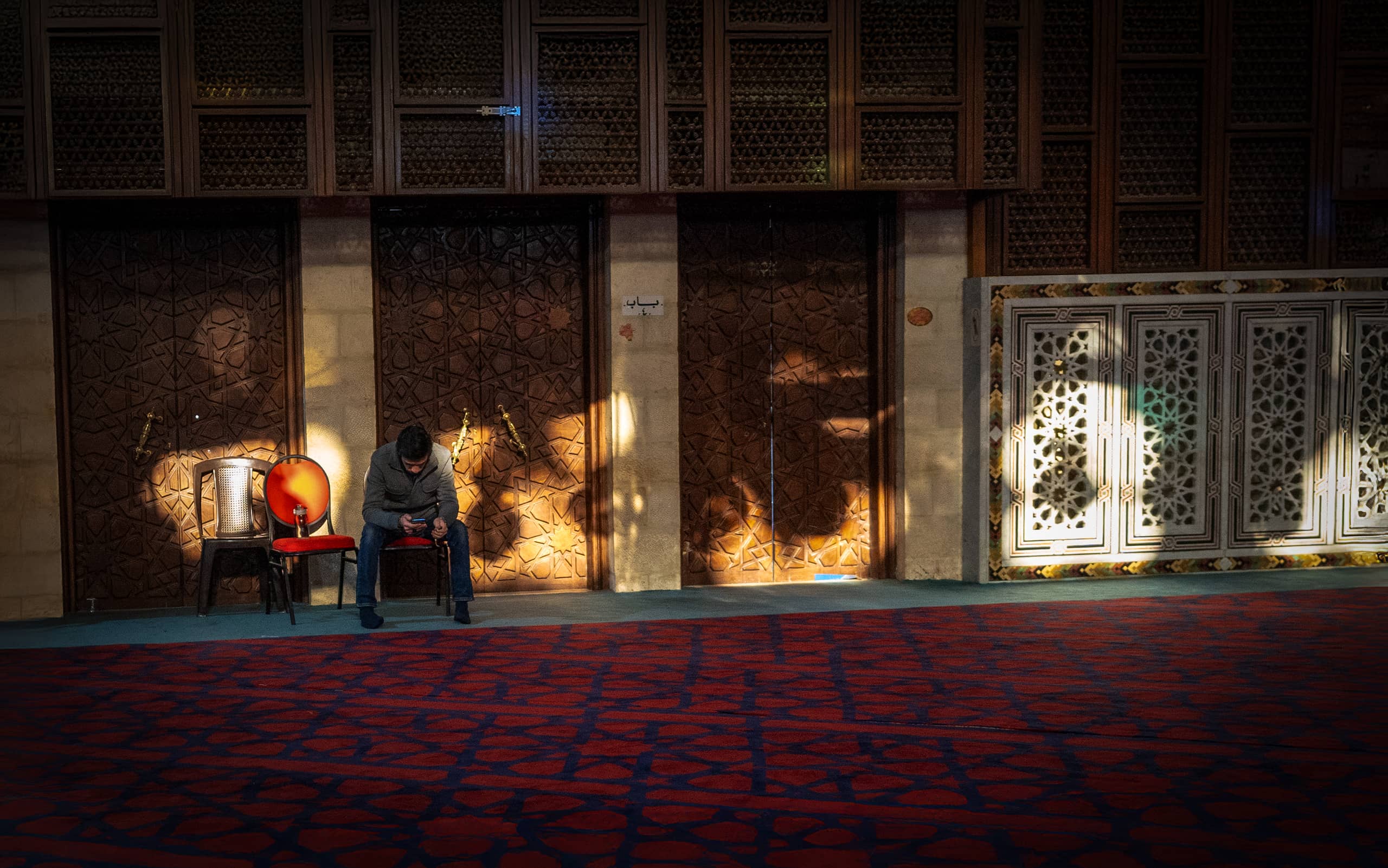 A MAN Wait ON Chire Masjed RED, a fine-art photograph by Ali Abu Ras