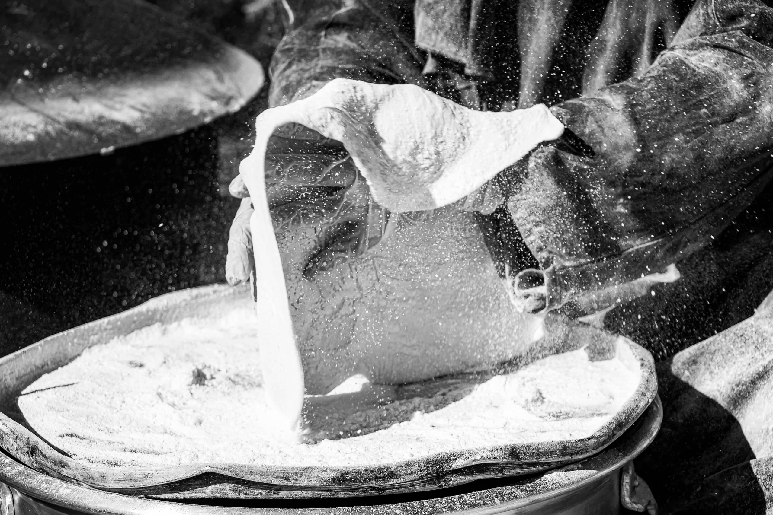 0 Woman Work Made Bread Graessa Black White, a fine-art photograph by Ali Abu Ras