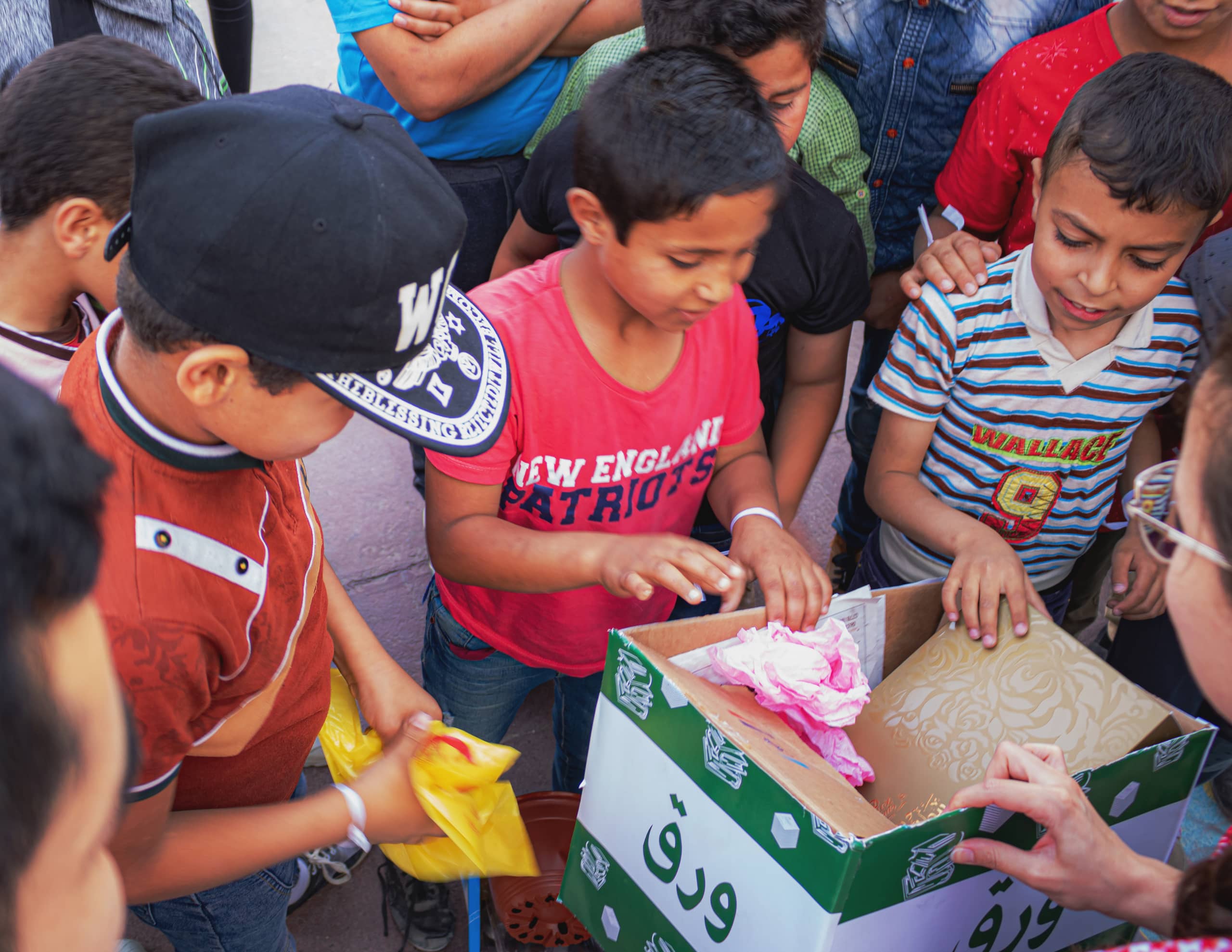 People Boys Playes AND BOX, a fine-art photograph by Ali Abu Ras