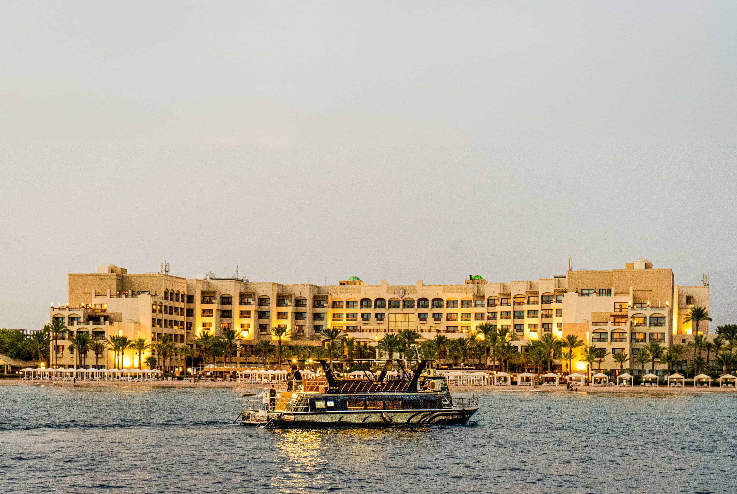 Ship Boat Sunset Aqaba, a fine-art photograph by Ali Abu Ras
