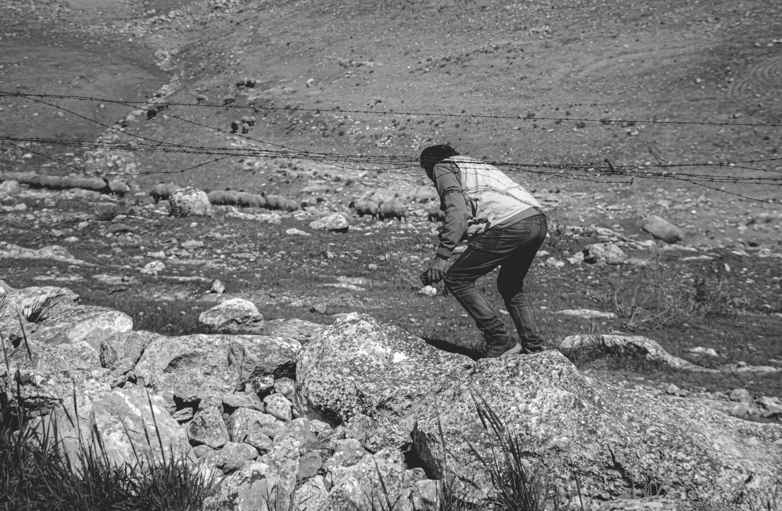0 Hashmiah THE Crossing People Fenc, a fine-art photograph by Ali Abu Ras