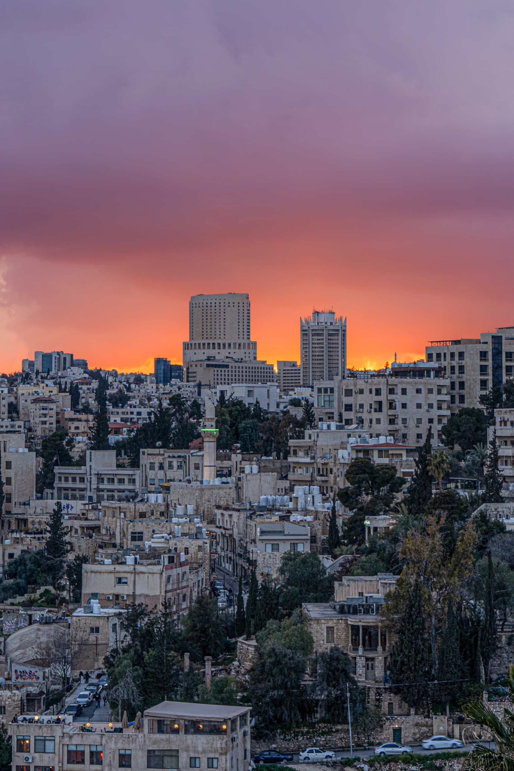 Amman Sunset Orang Towers, a fine-art photograph by Ali Abu Ras