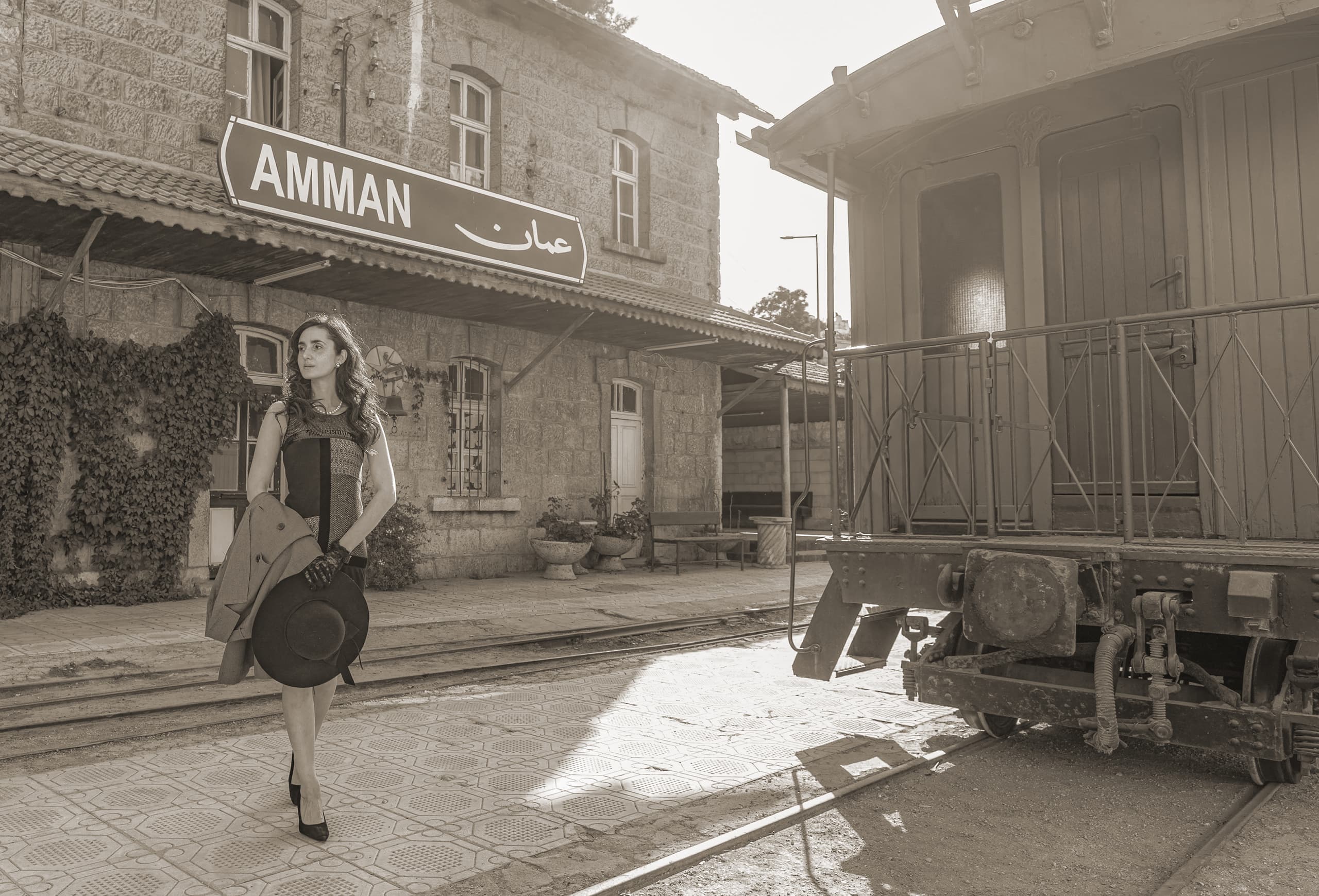 Noor RED Dress Train, a fine-art photograph by Ali Abu Ras