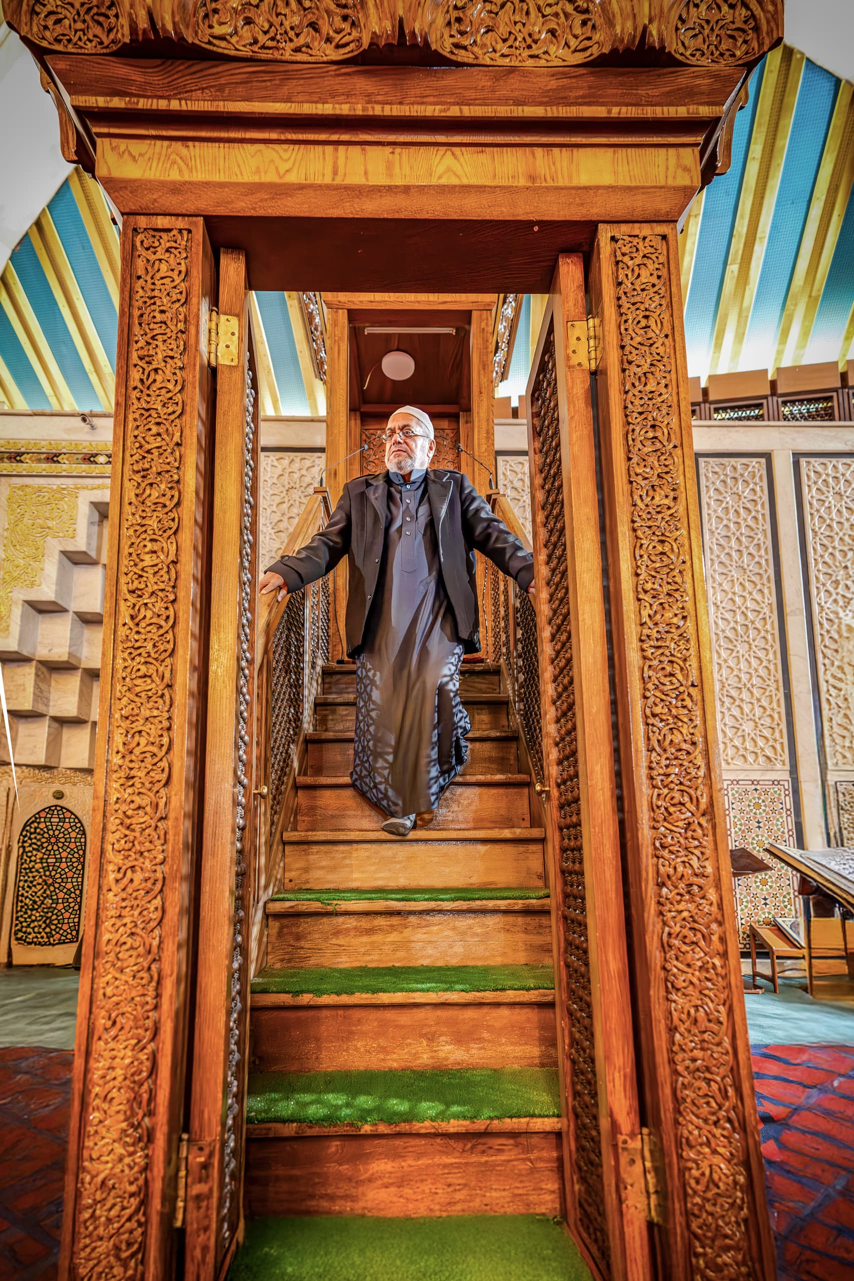 MAN Stares Masjed Pray, a fine-art photograph by Ali Abu Ras