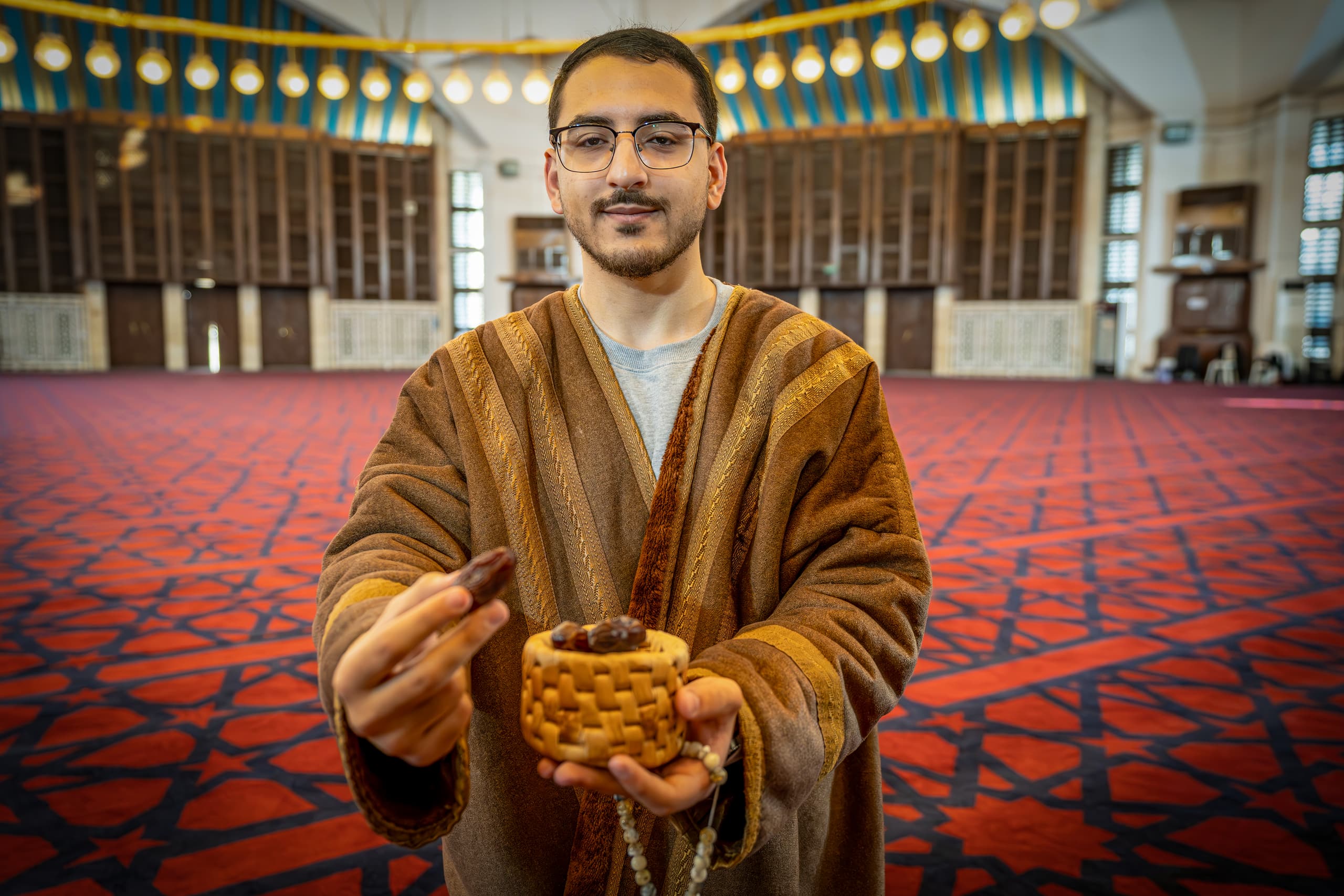 MAN Masji Dates Ramadan, a fine-art photograph by Ali Abu Ras