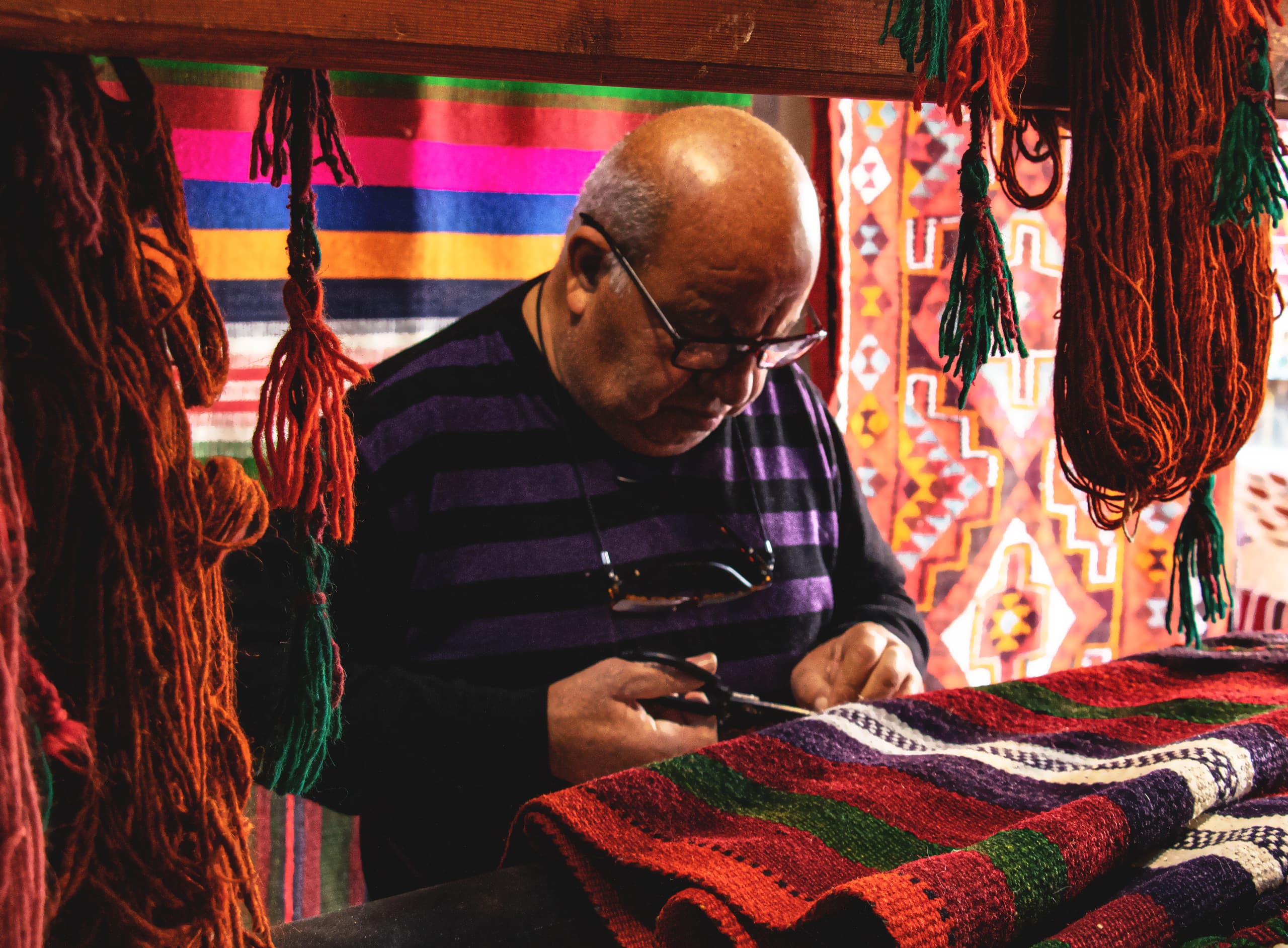 Madaba Market Carbets Store MAN, a fine-art photograph by Ali Abu Ras