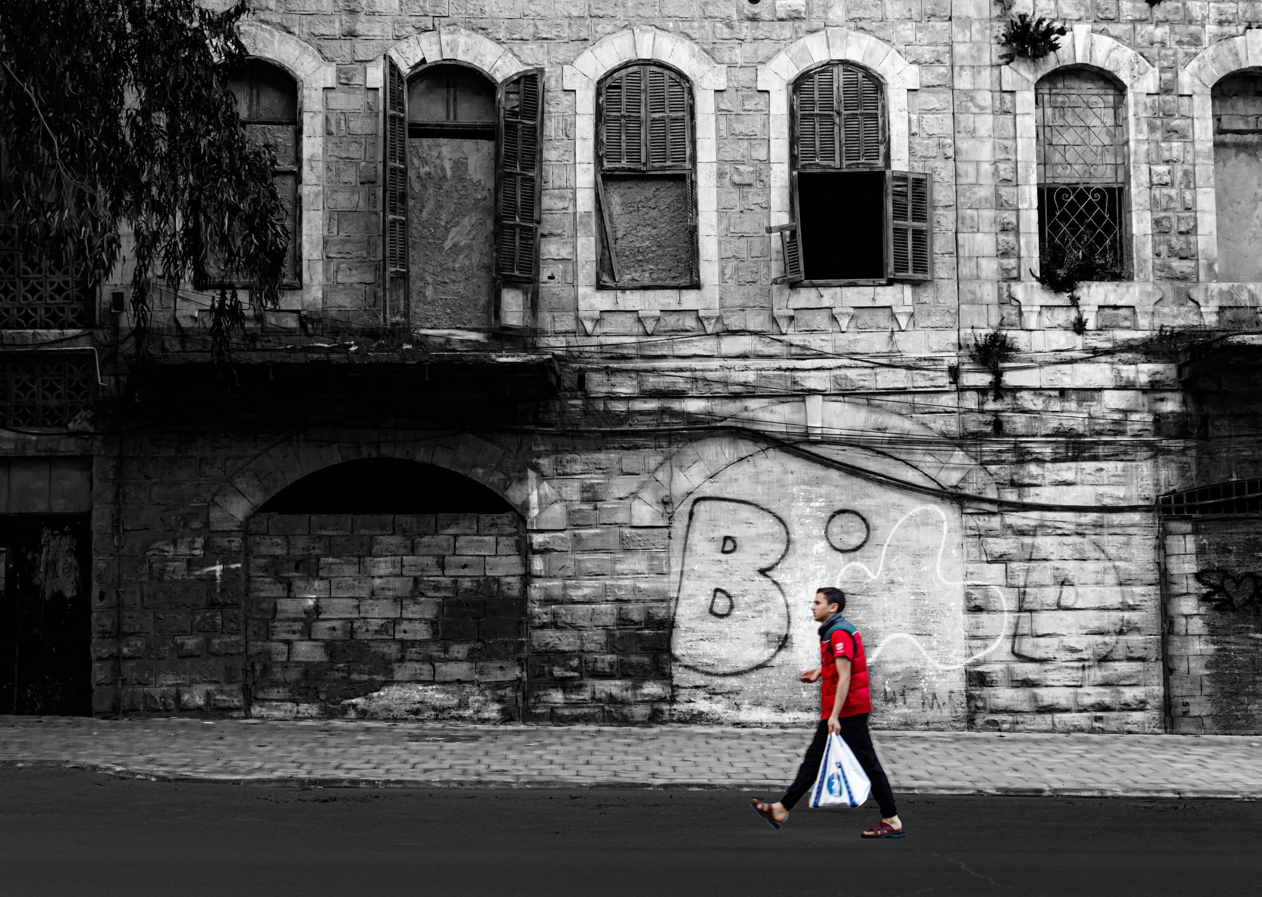 People Ammancenter MAN Walk Habeba Edit Black AND, a fine-art photograph by Ali Abu Ras