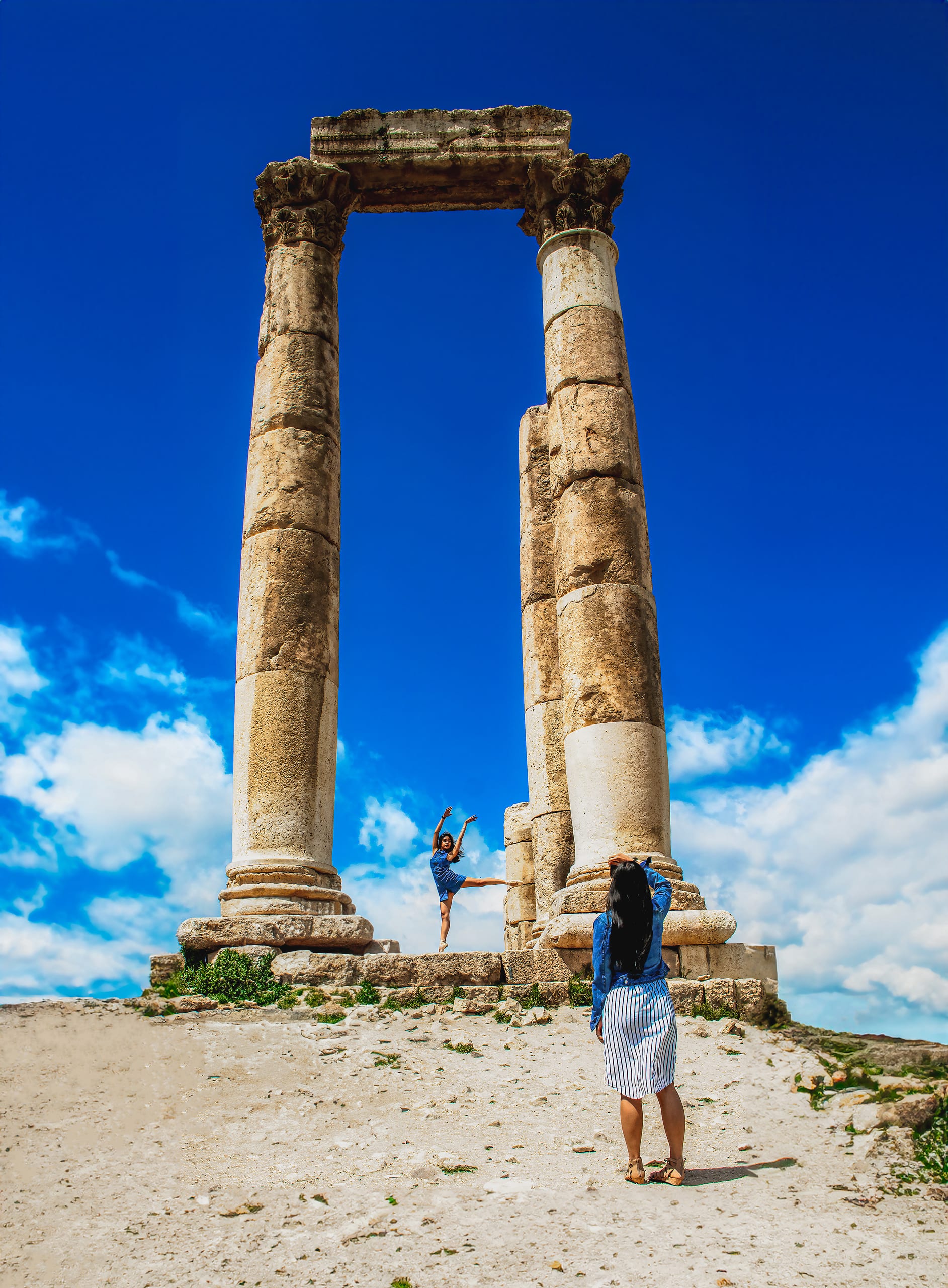 Amman Citdel Woman Posing IN Hurkels Tempel Edit, a fine-art photograph by Ali Abu Ras