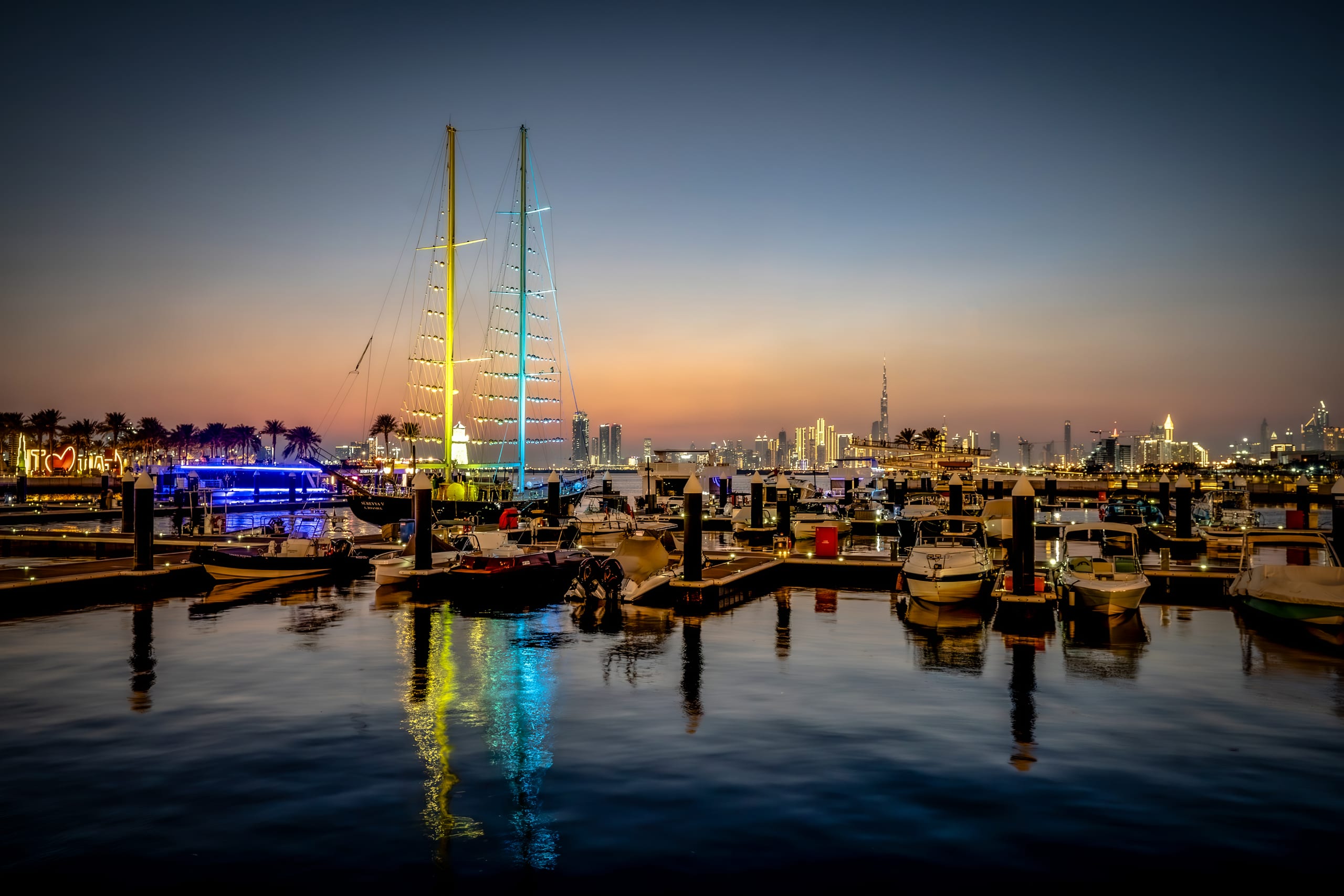Cityscape Lights Boats Dubai, a fine-art photograph by Ali Abu Ras