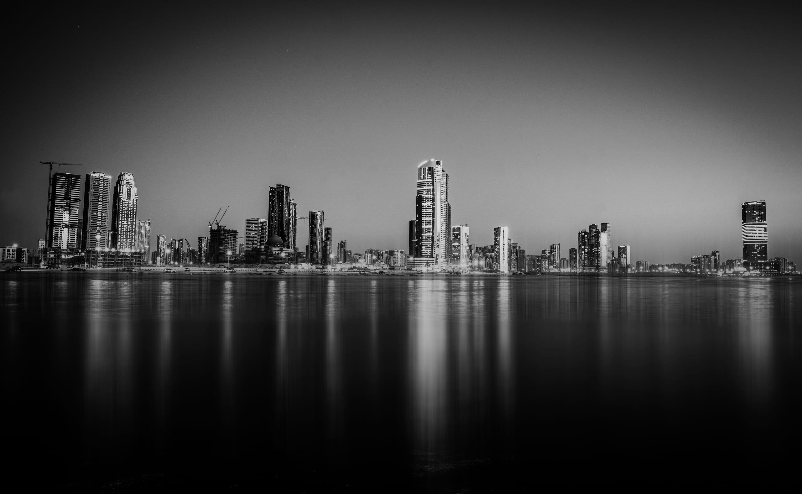 Dubai Alshareqa Building Night Expouer, a fine-art photograph by Ali Abu Ras