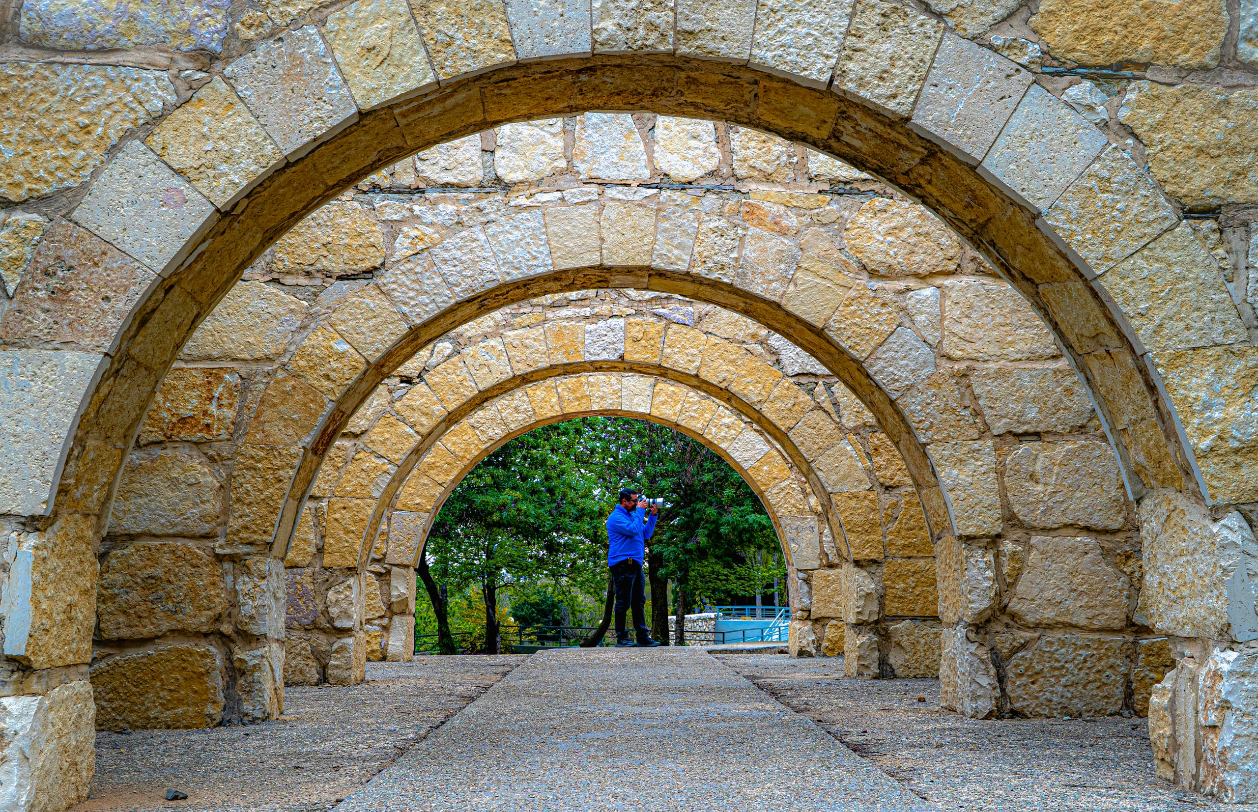 MAN Saed Stand Photographyer Archies, a fine-art photograph by Ali Abu Ras