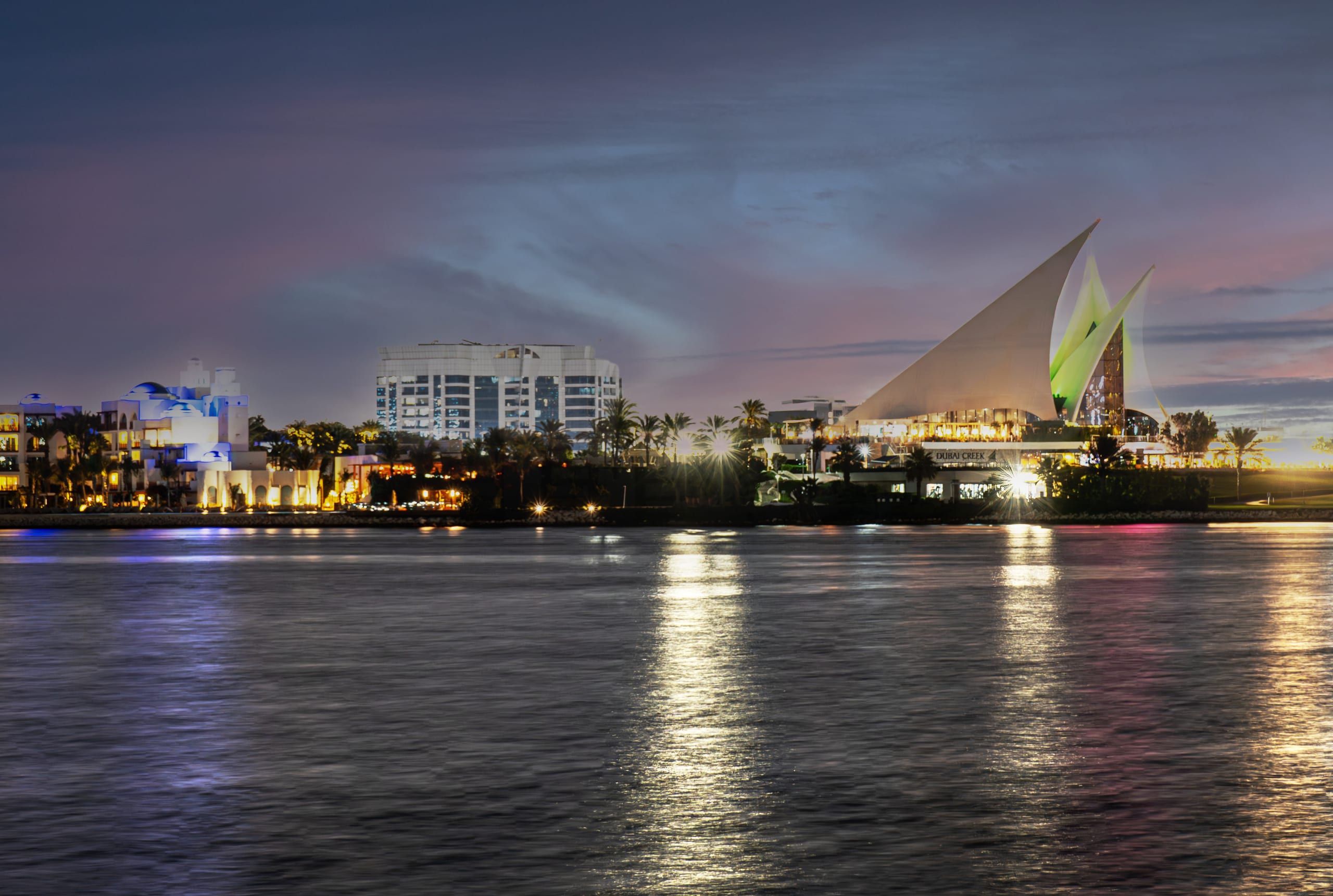 Dubai Water Building Night, a fine-art photograph by Ali Abu Ras