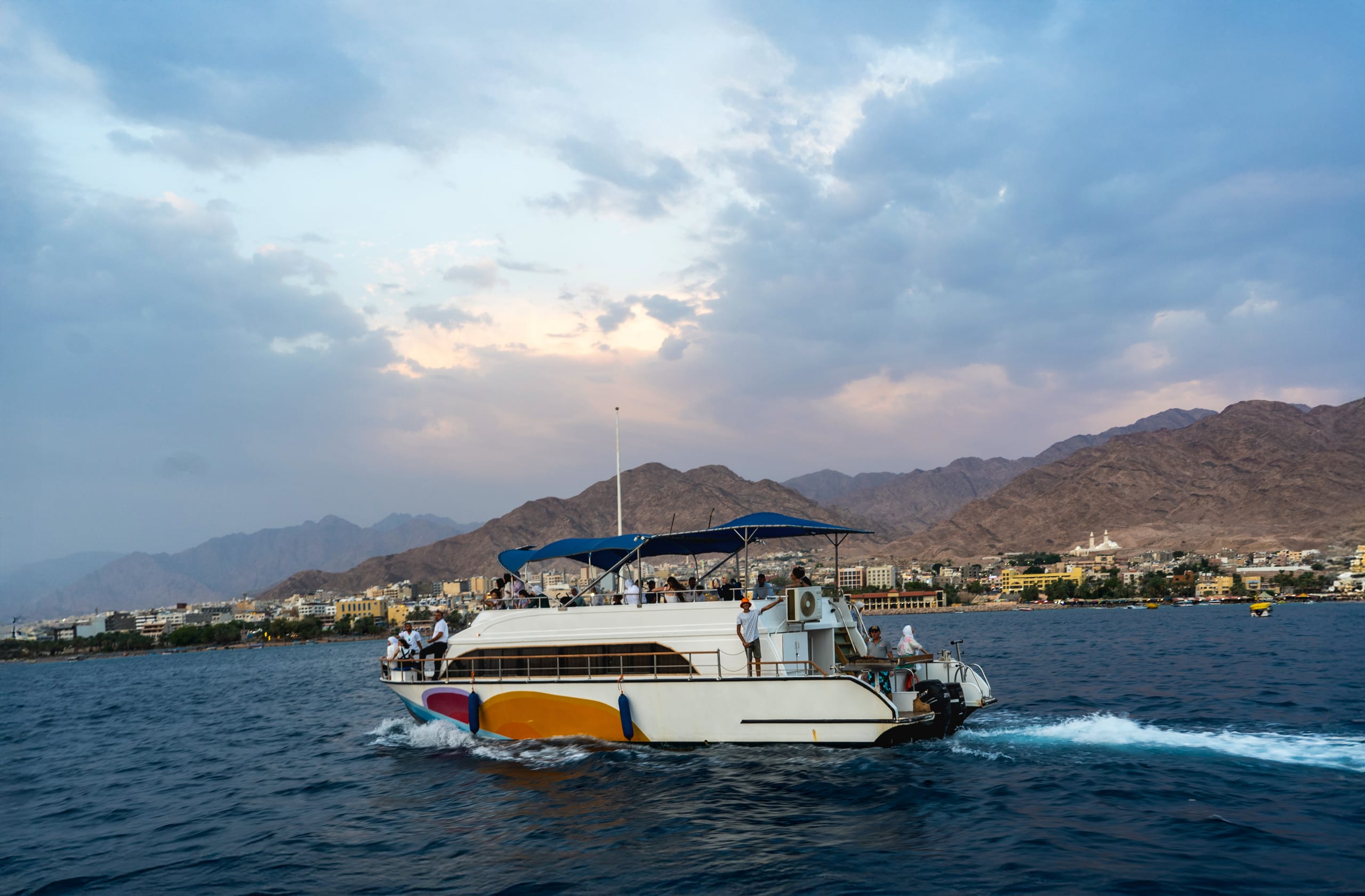 Ship Boat Sunset Aqaba, a fine-art photograph by Ali Abu Ras