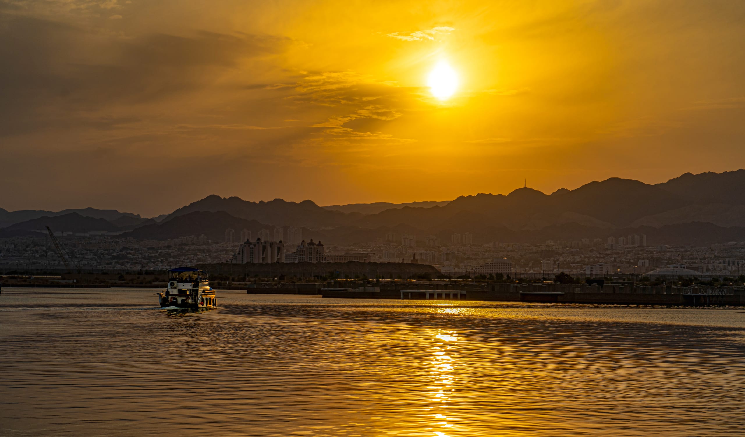 Ship Boat Sunset Aqaba, a fine-art photograph by Ali Abu Ras