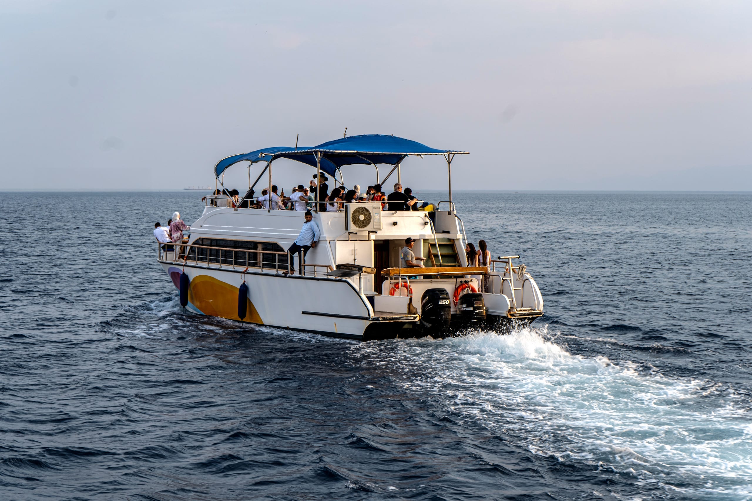 Ship Boat Sunset Aqaba, a fine-art photograph by Ali Abu Ras