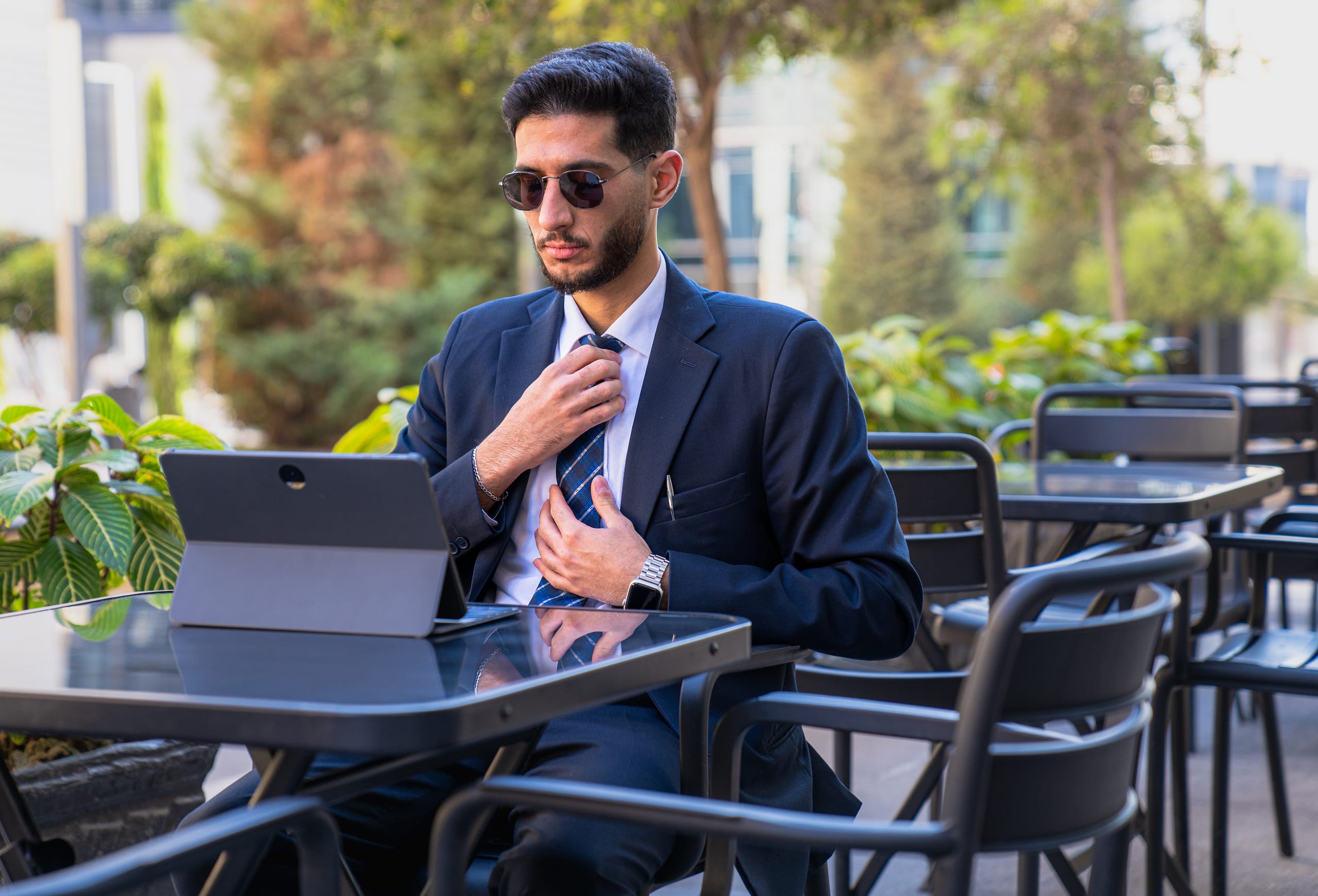 MAN Laptop Table Outdoor, a fine-art photograph by Ali Abu Ras