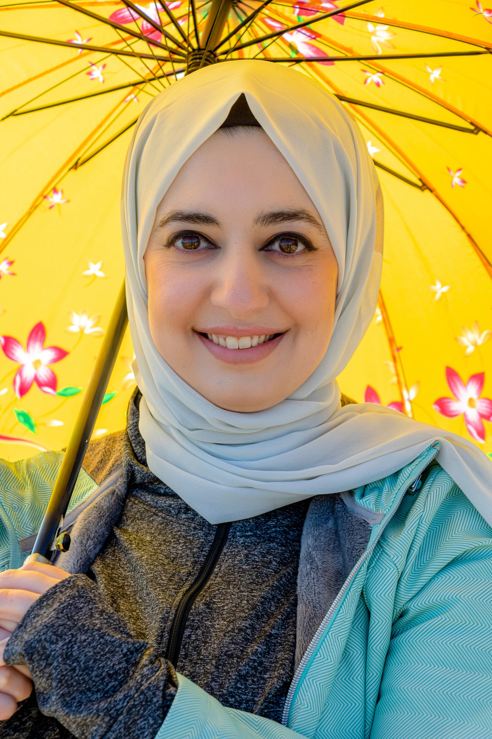Woman Rola Potrait Face SUN Umbrela, a fine-art photograph by Ali Abu Ras