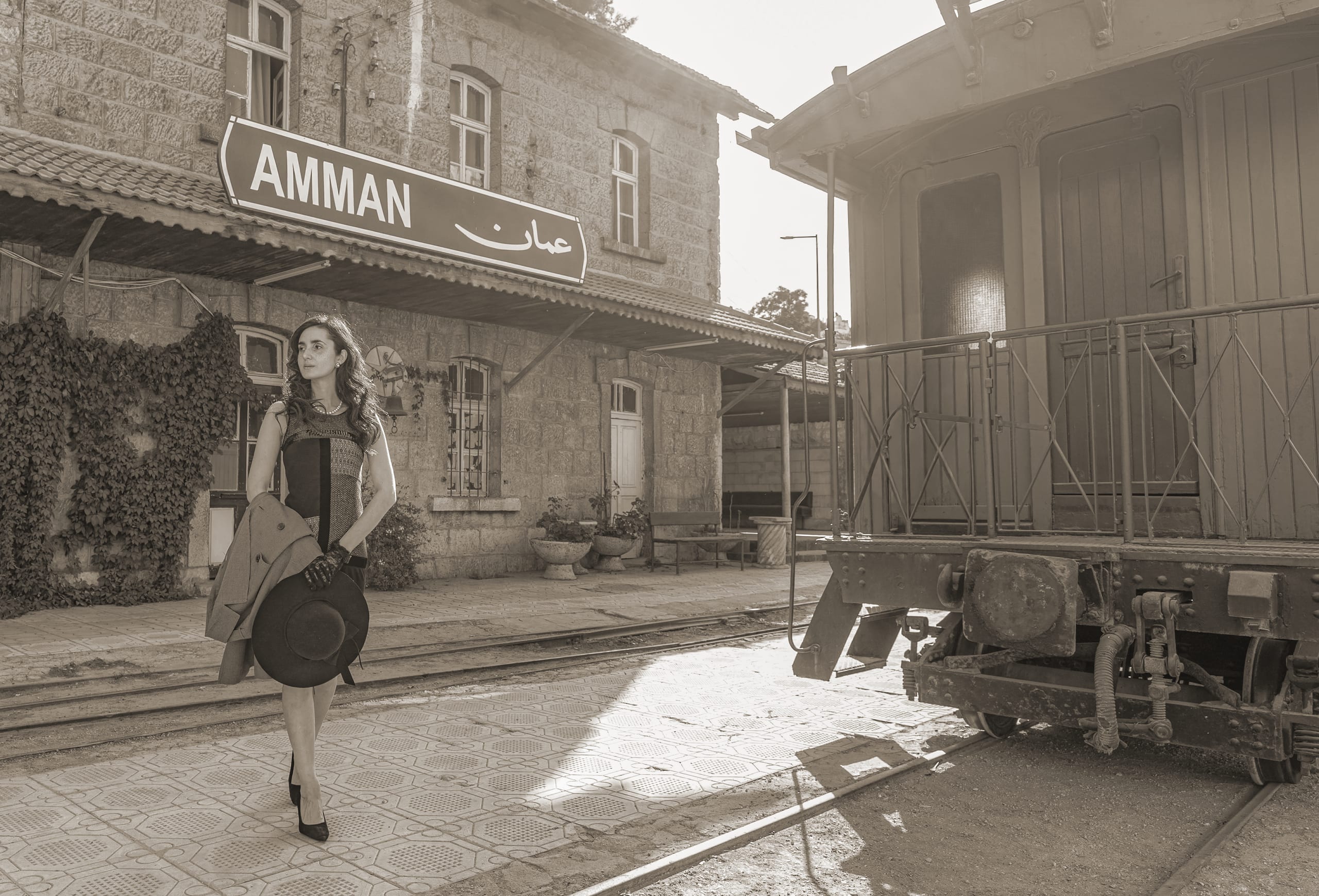 Noor RED Dress Train, a fine-art photograph by Ali Abu Ras