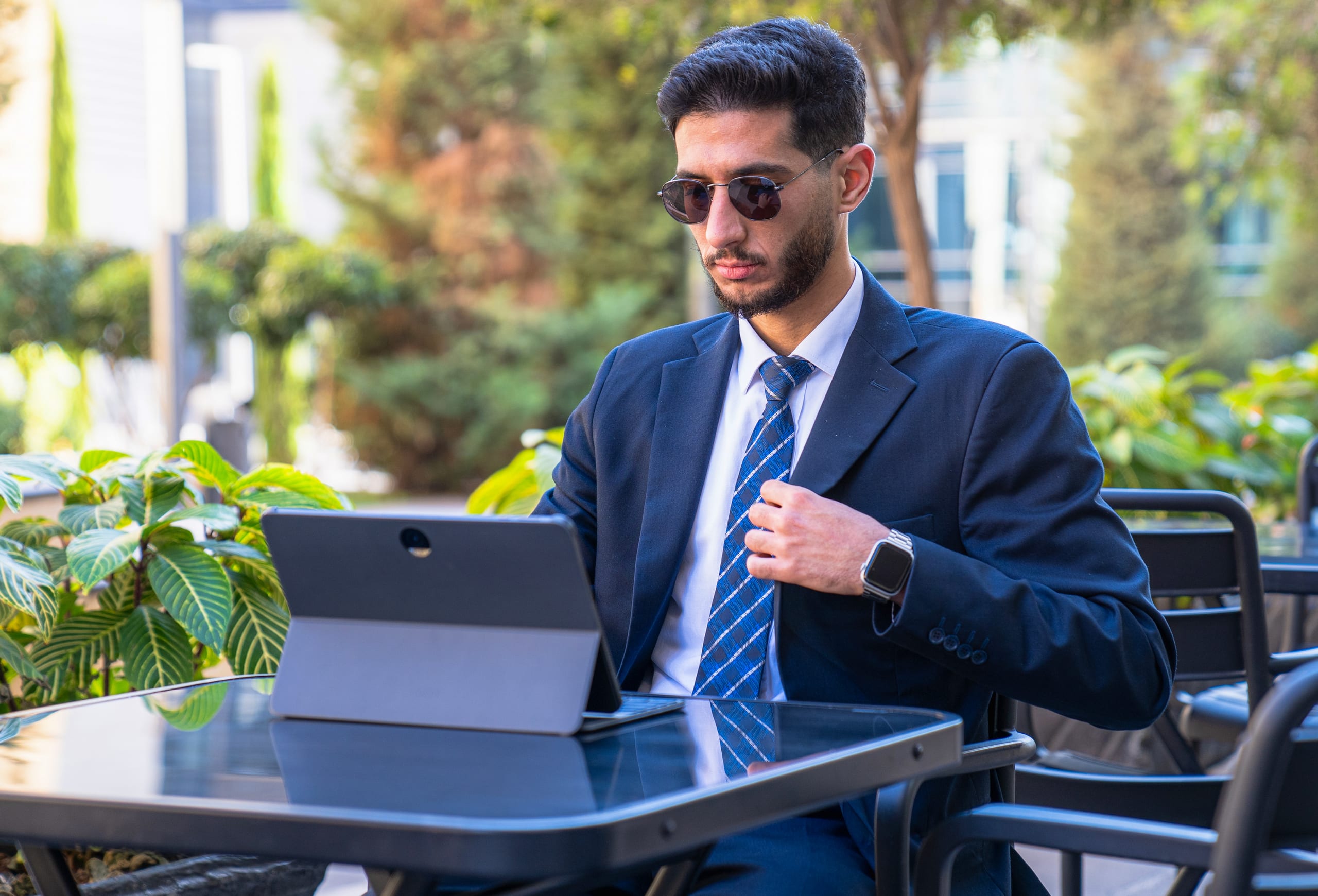 MAN Laptop Table Outdoor, a fine-art photograph by Ali Abu Ras
