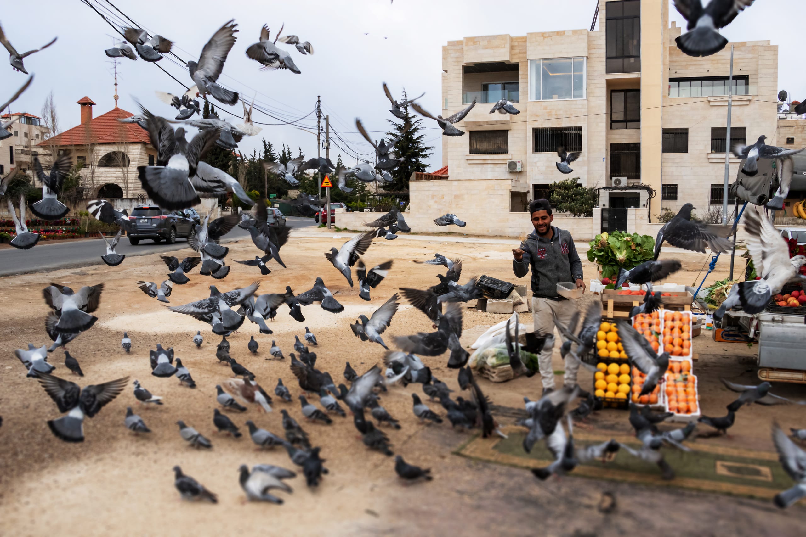 People Seller AND Birds 7, a fine-art photograph by Ali Abu Ras