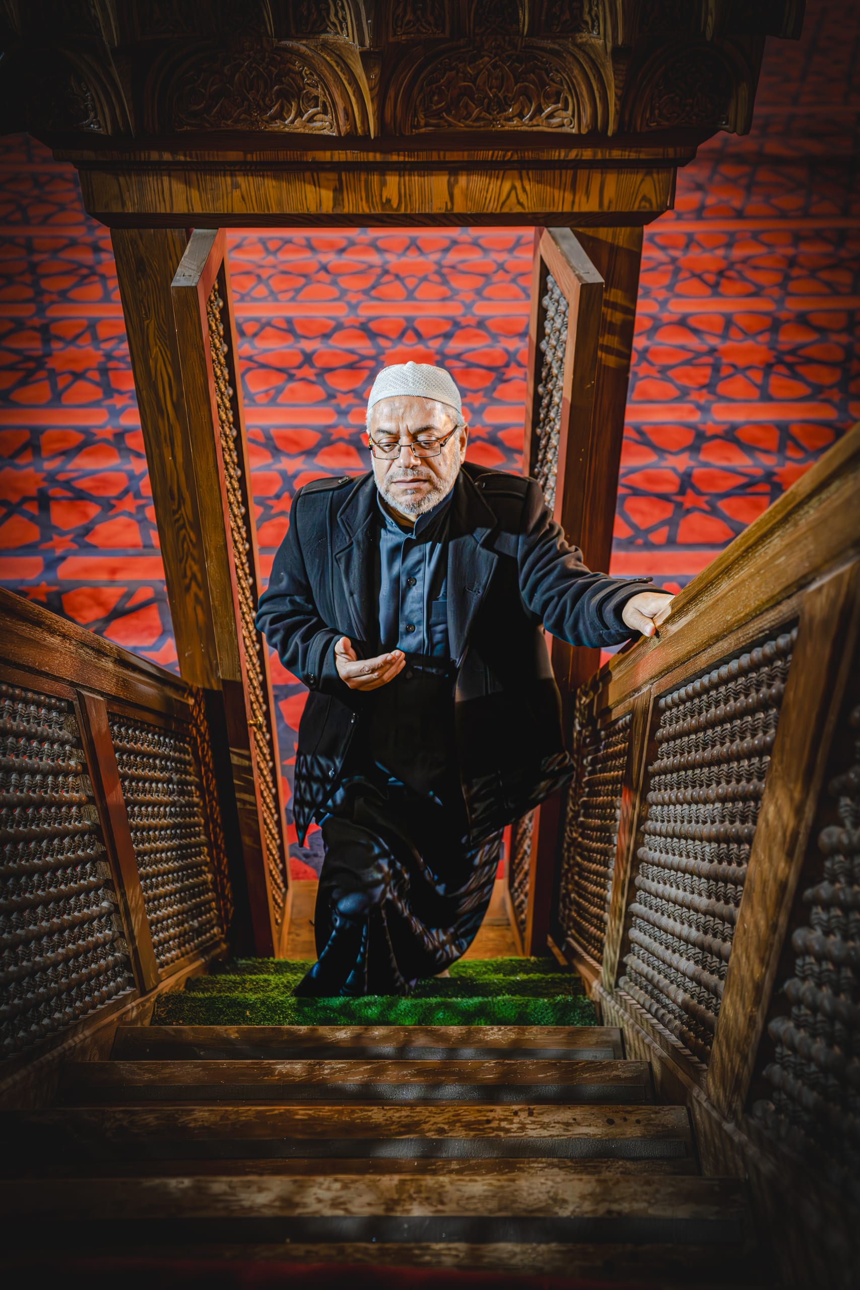 MAN Stares Masjed Pray, a fine-art photograph by Ali Abu Ras