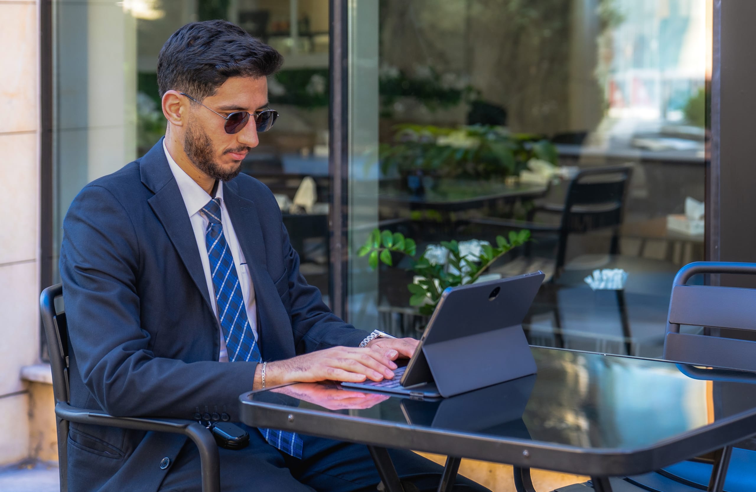 MAN Laptop Table Outdoor, a fine-art photograph by Ali Abu Ras