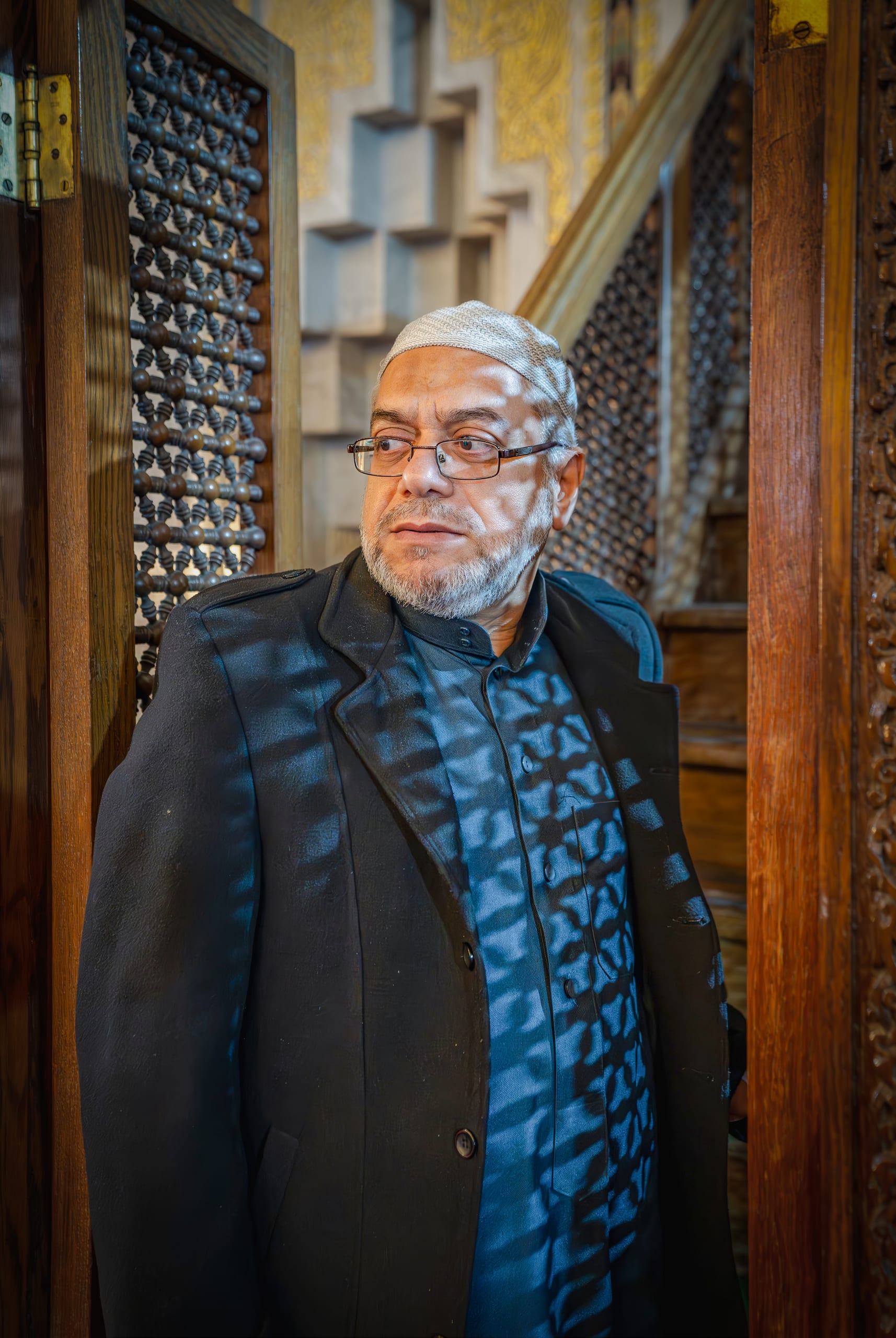 MAN OLD Masjed Pray, a fine-art photograph by Ali Abu Ras
