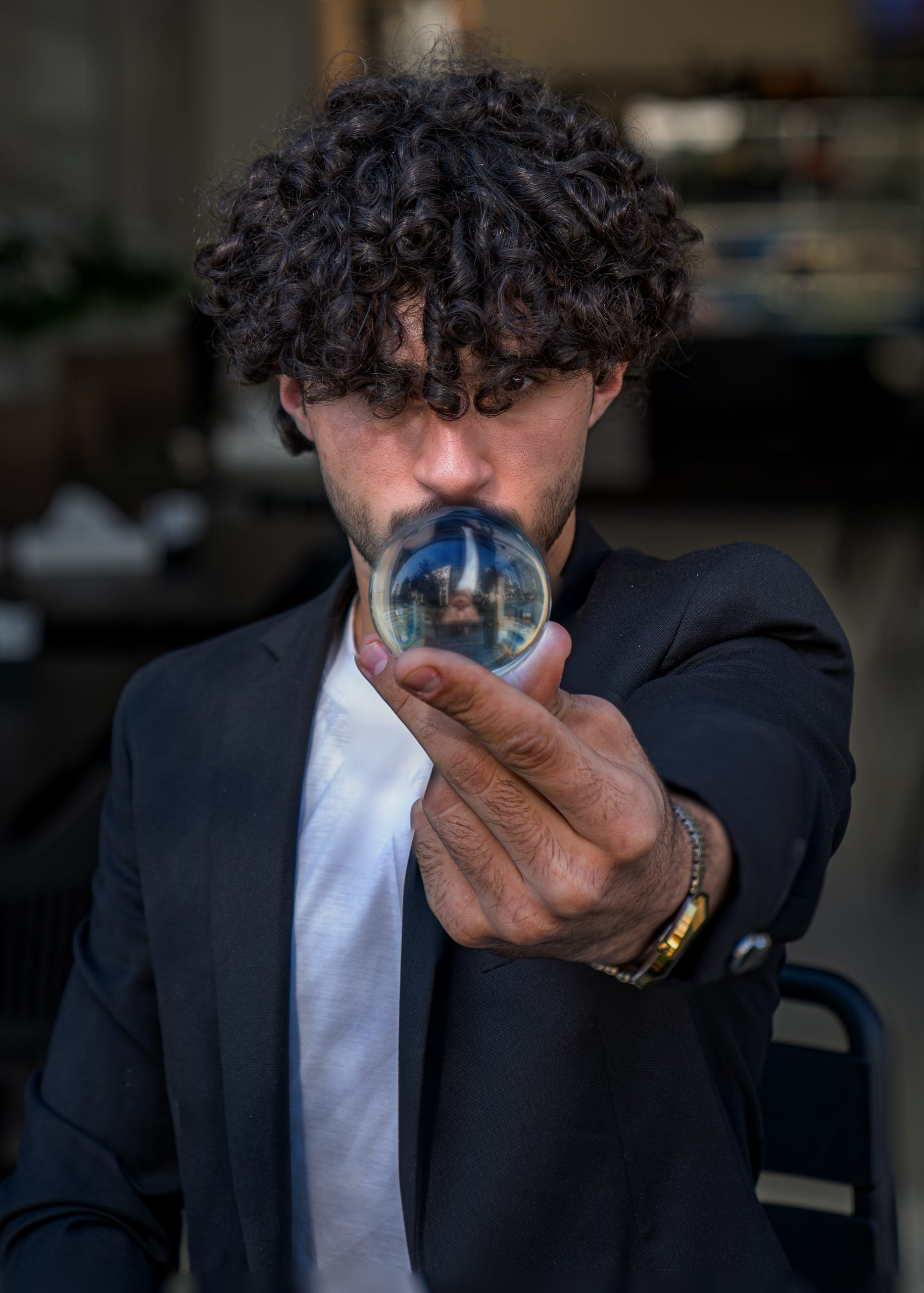 MAN Sufer Cryctal Glass Reflection, a fine-art photograph by Ali Abu Ras