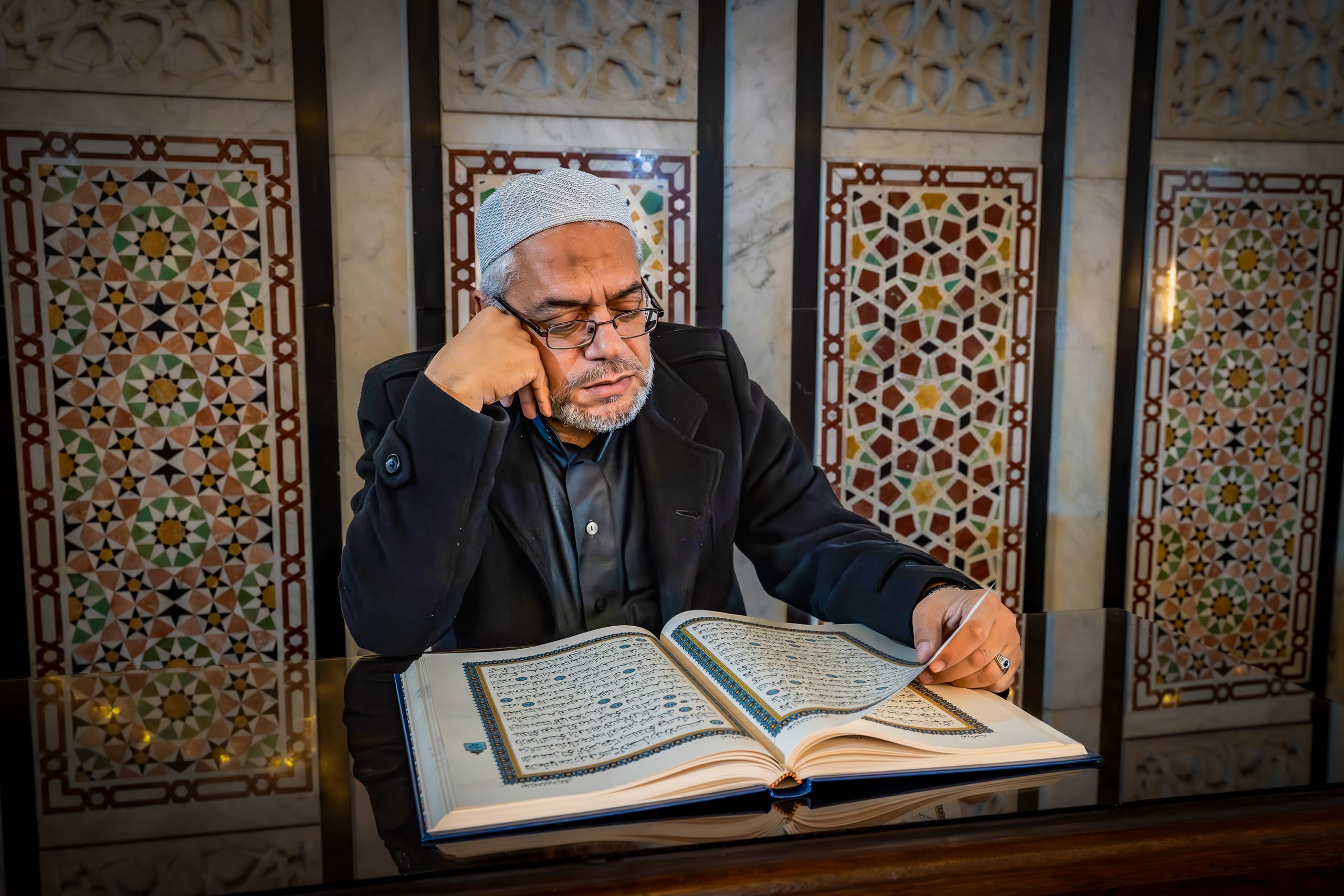 MAN Read Quran Masjid Ramadain Sunlight, a fine-art photograph by Ali Abu Ras