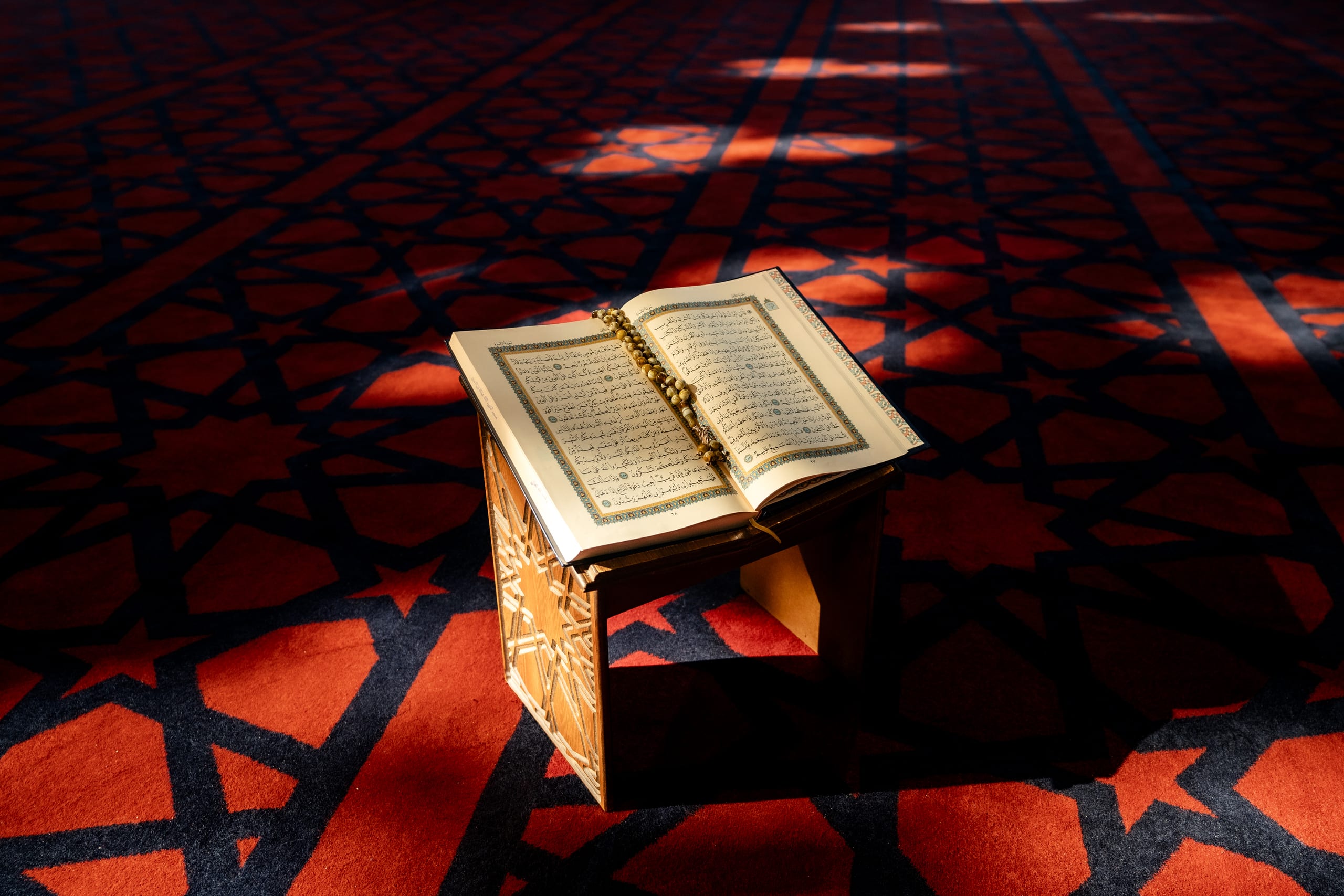 Quran Book Masjed RED, a fine-art photograph by Ali Abu Ras