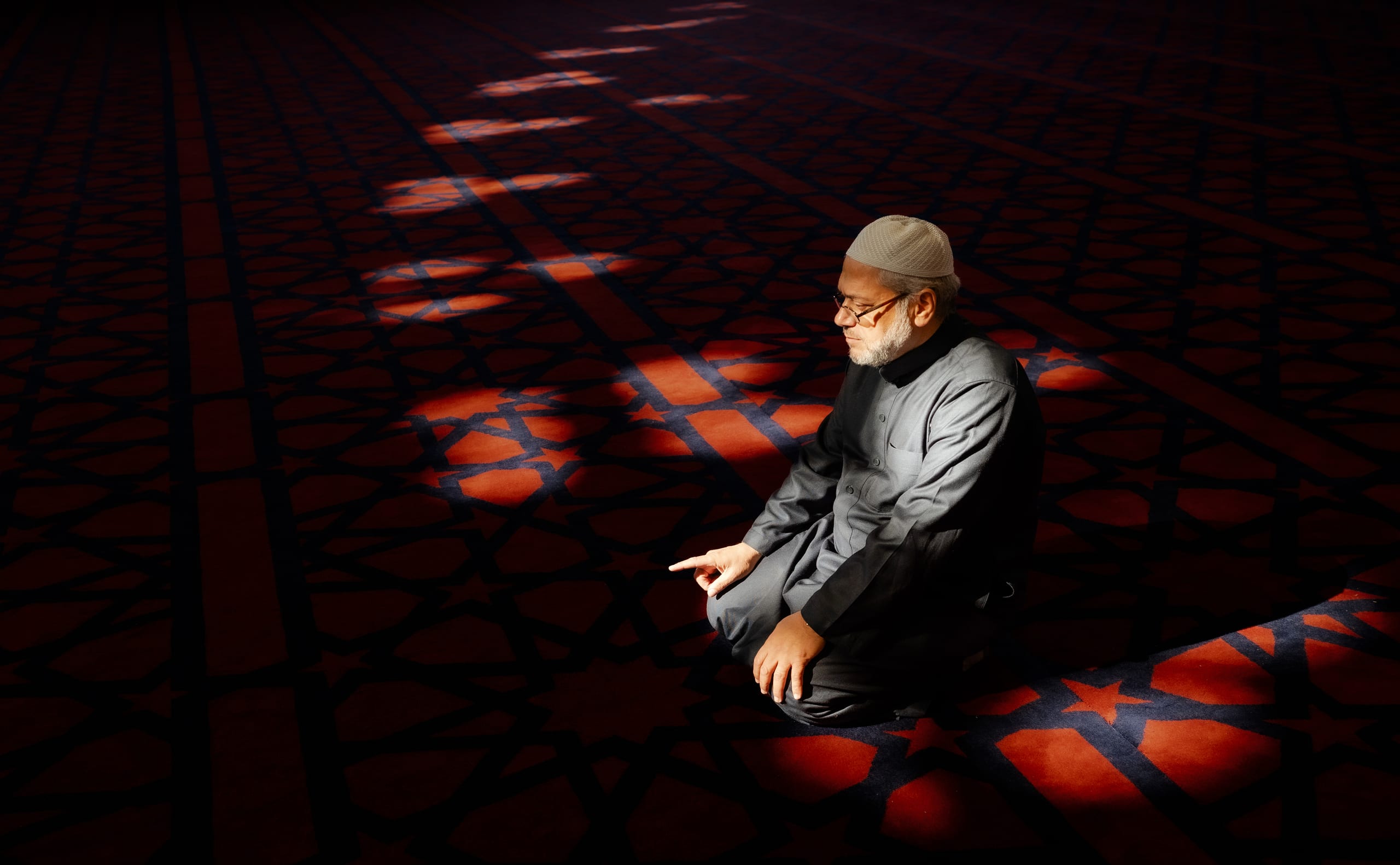 MAN Read Quran Masjid Ramadain, a fine-art photograph by Ali Abu Ras