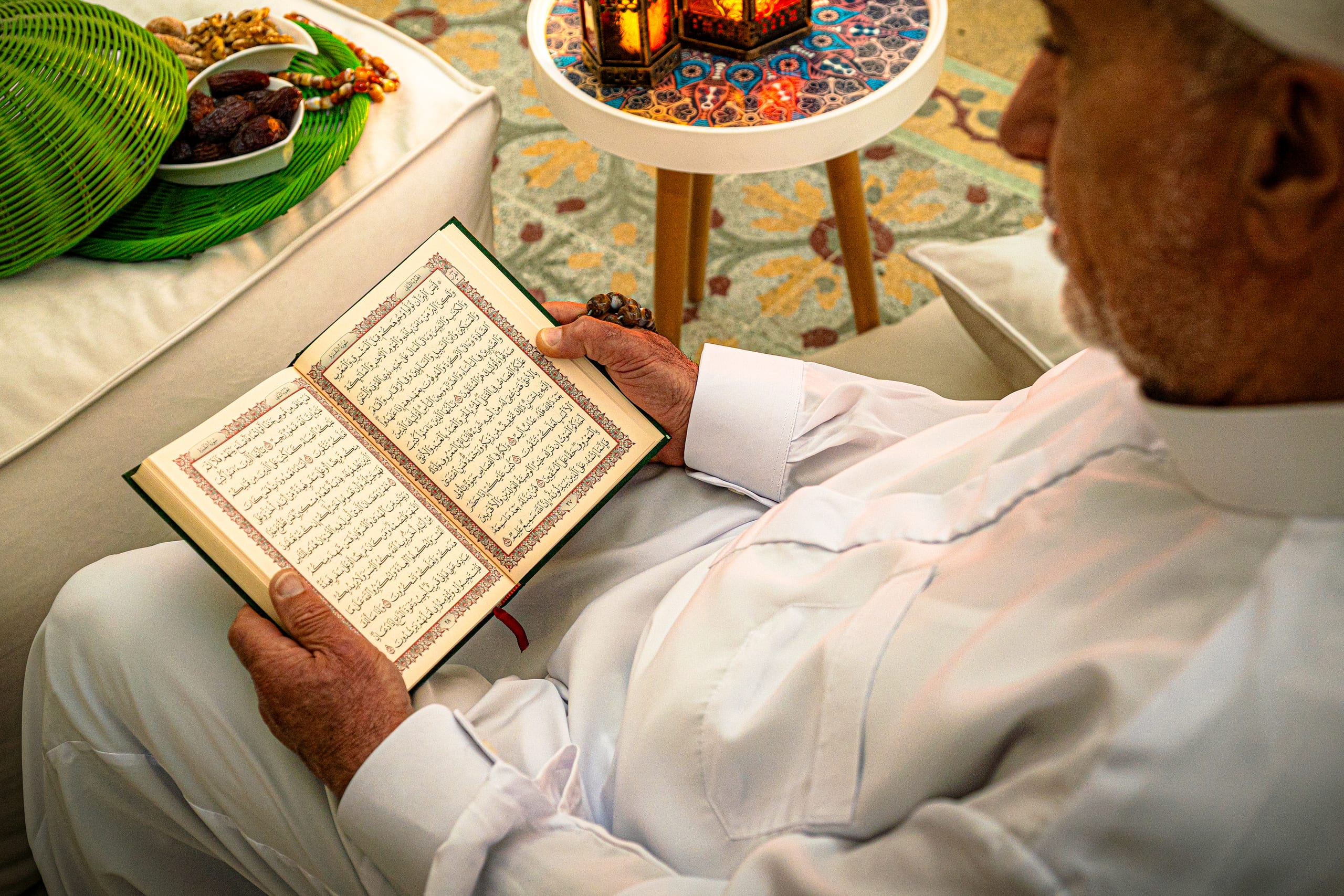 MAN OLD Read Quran Ramadan City Background, a fine-art photograph by Ali Abu Ras