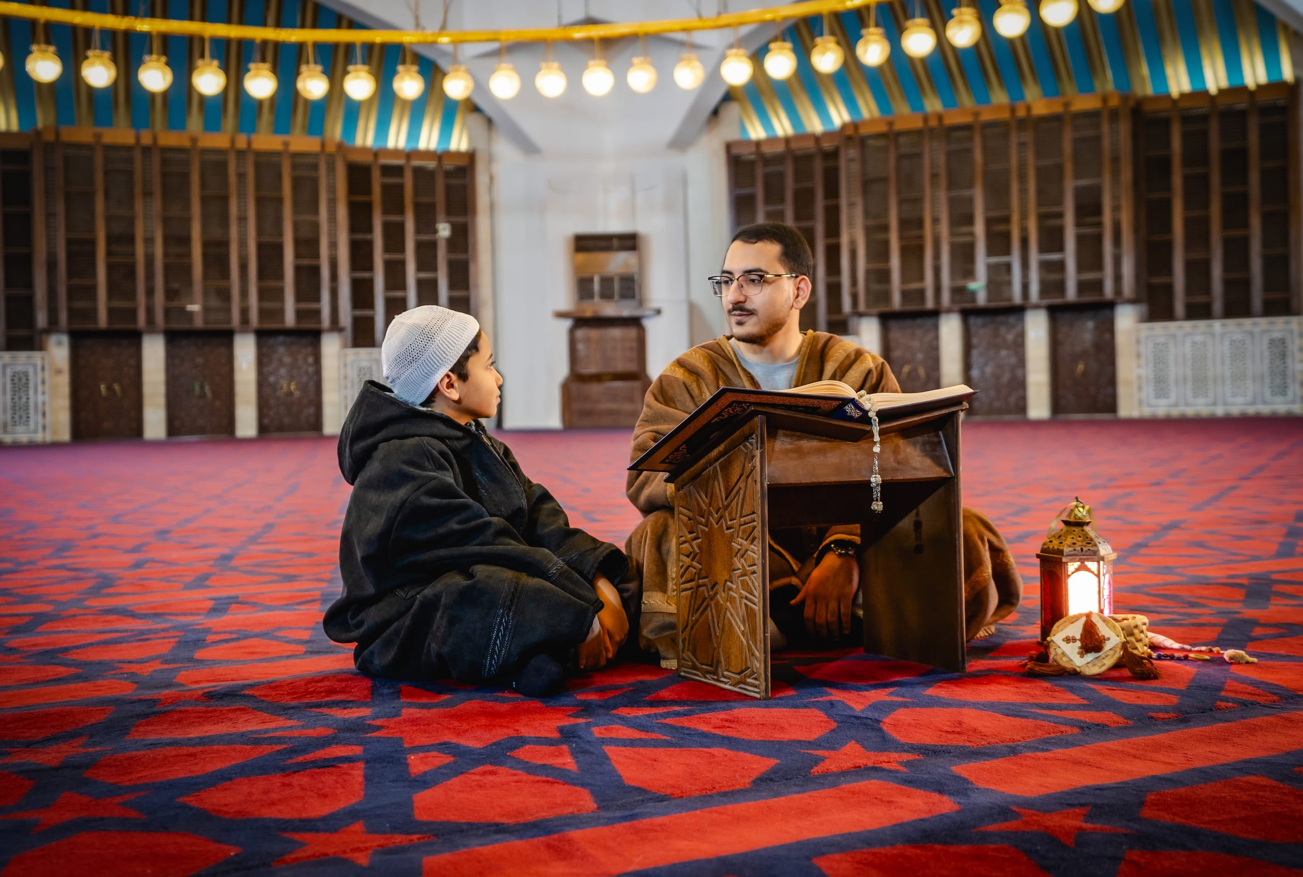BOY Father Masjed Quran, a fine-art photograph by Ali Abu Ras