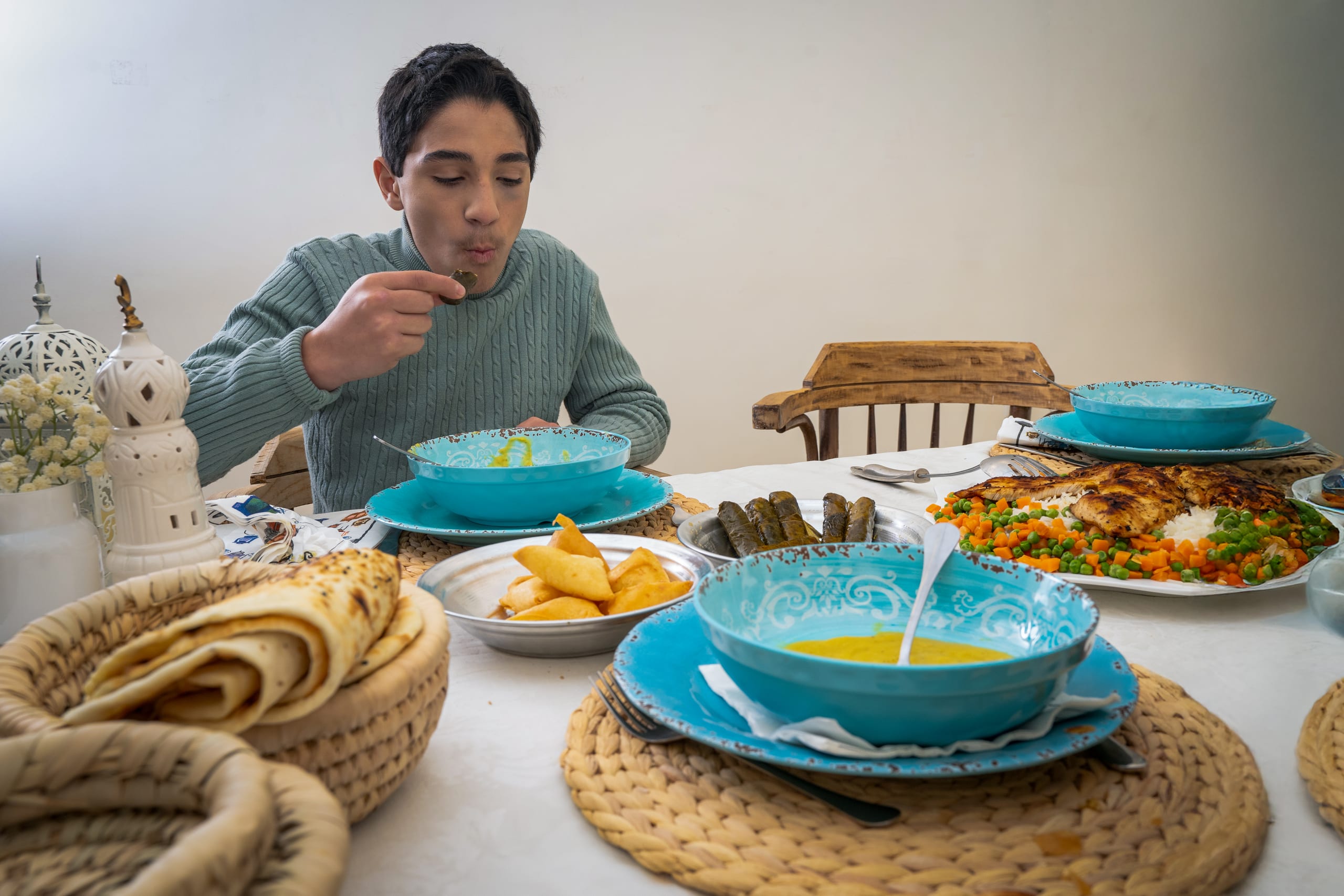 Family Ramadan Eftar Food Eating, a fine-art photograph by Ali Abu Ras