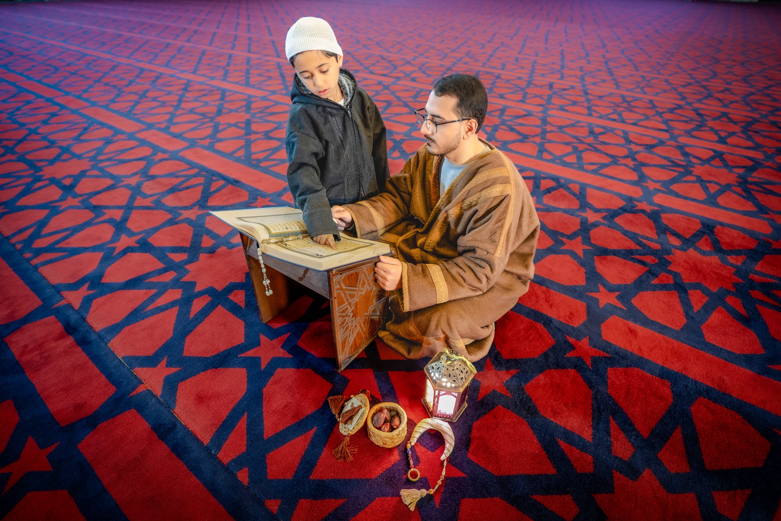1 BOY Father Masjed Quran, a fine-art photograph by Ali Abu Ras