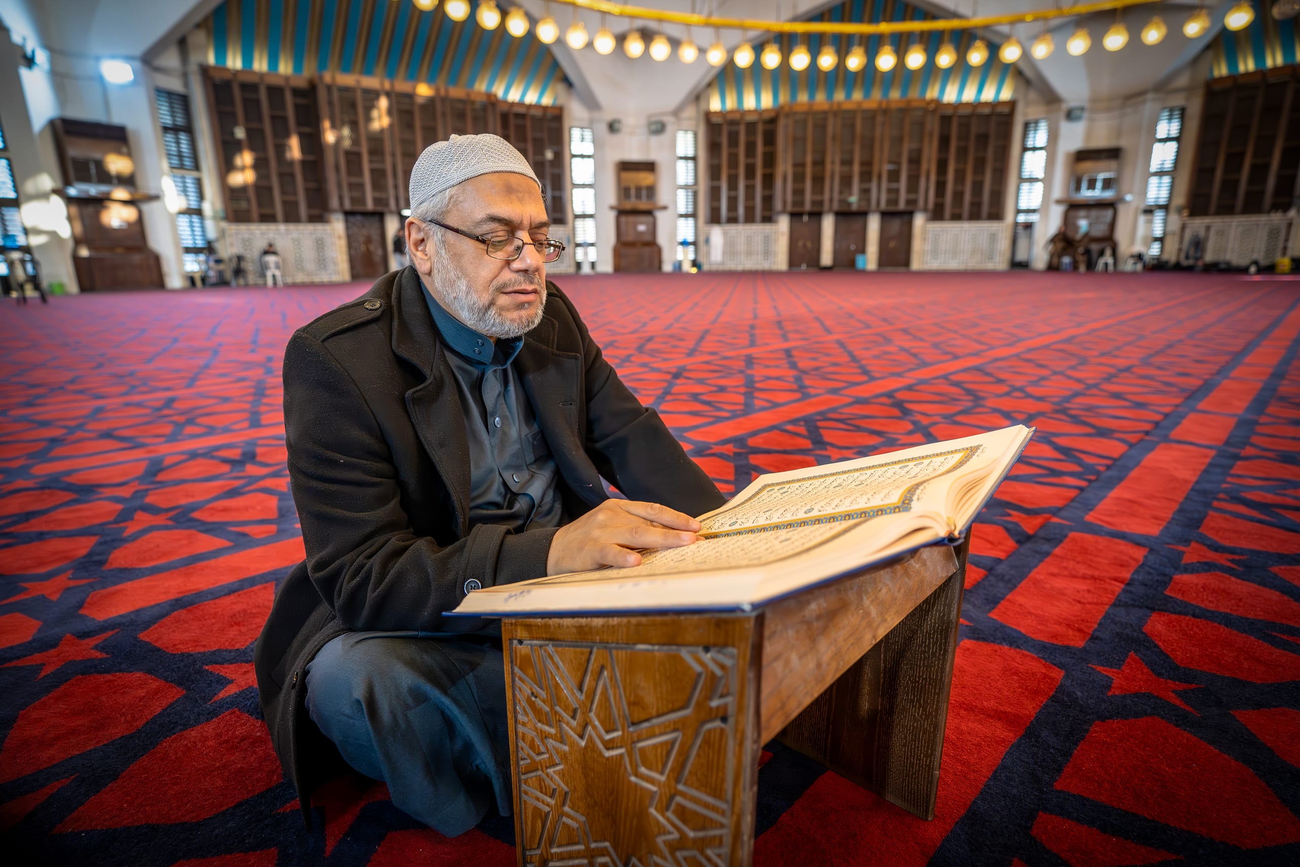 OLD MAN Read Quran Masjid Ramadain, a fine-art photograph by Ali Abu Ras