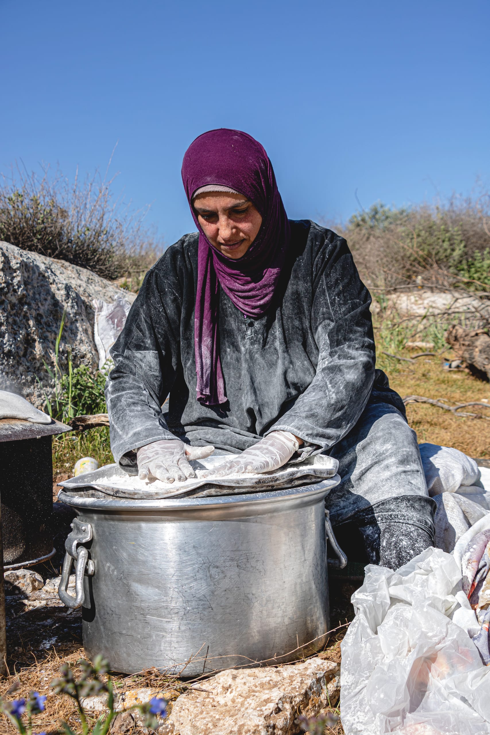 Woman Work Create Bread Outdoor Graesa, a fine-art photograph by Ali Abu Ras