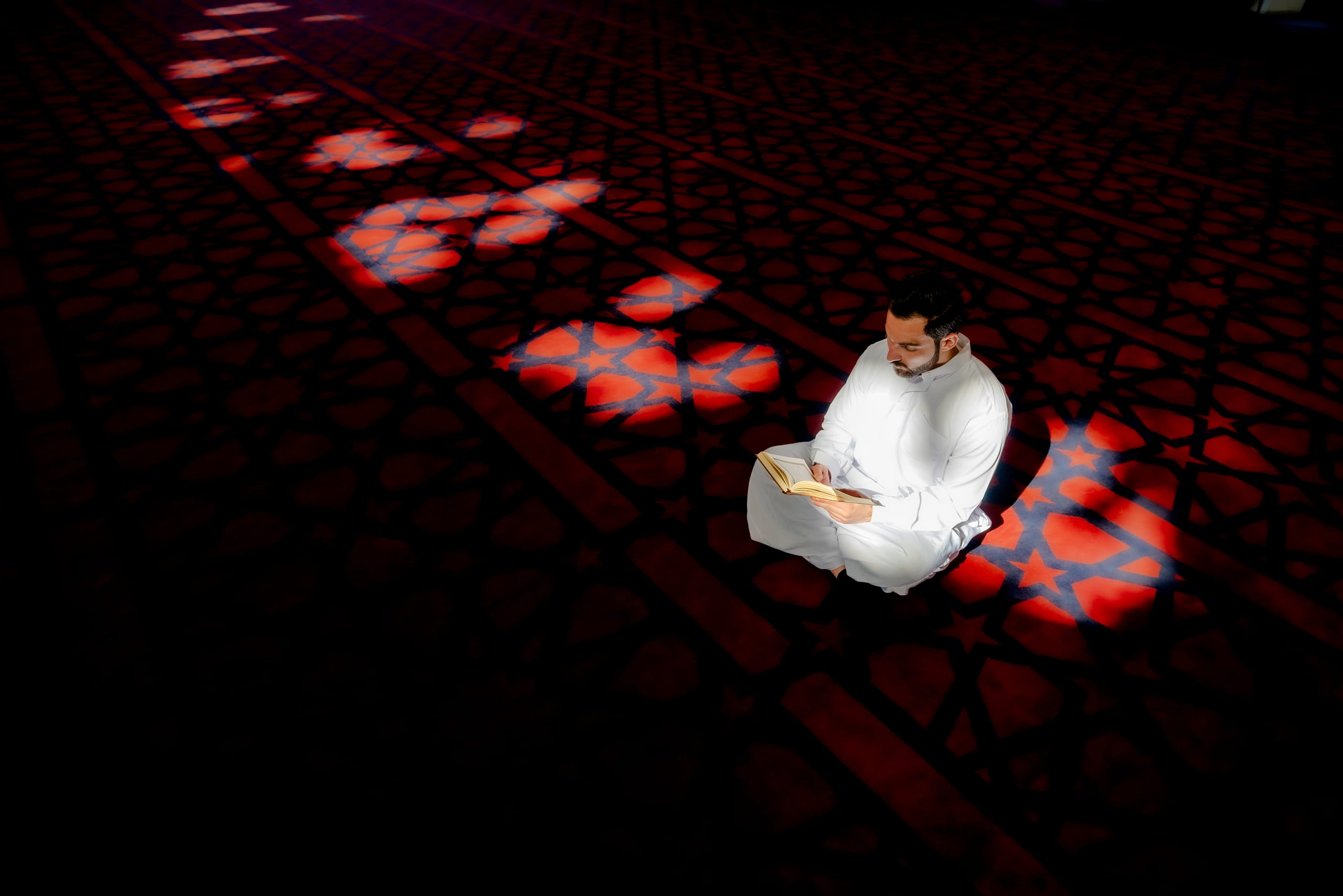 1 MAN Read Quran Masjid Ramadain, a fine-art photograph by Ali Abu Ras