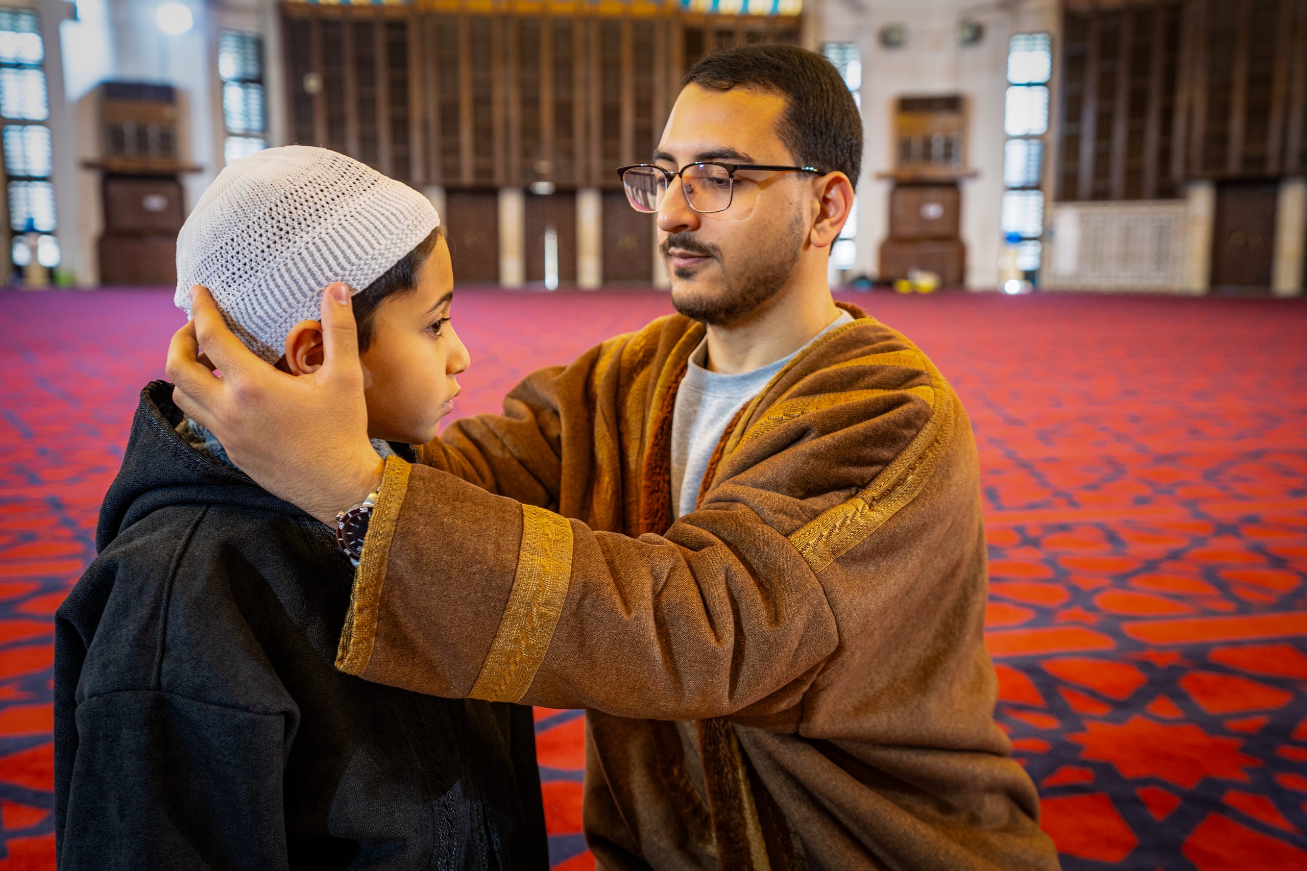 BOY Father Masjed Quran 0, a fine-art photograph by Ali Abu Ras