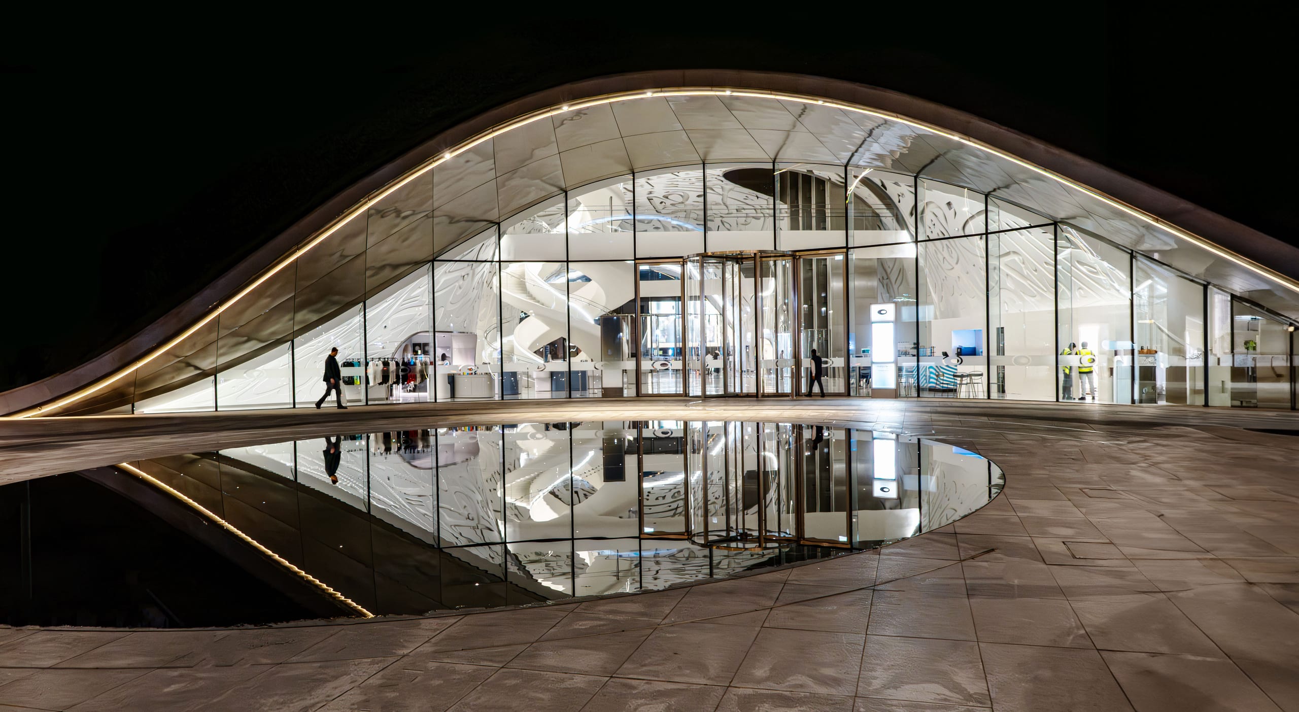 Frame Contest Dubai Futuer Building Night MAN Small, a fine-art photograph by Ali Abu Ras