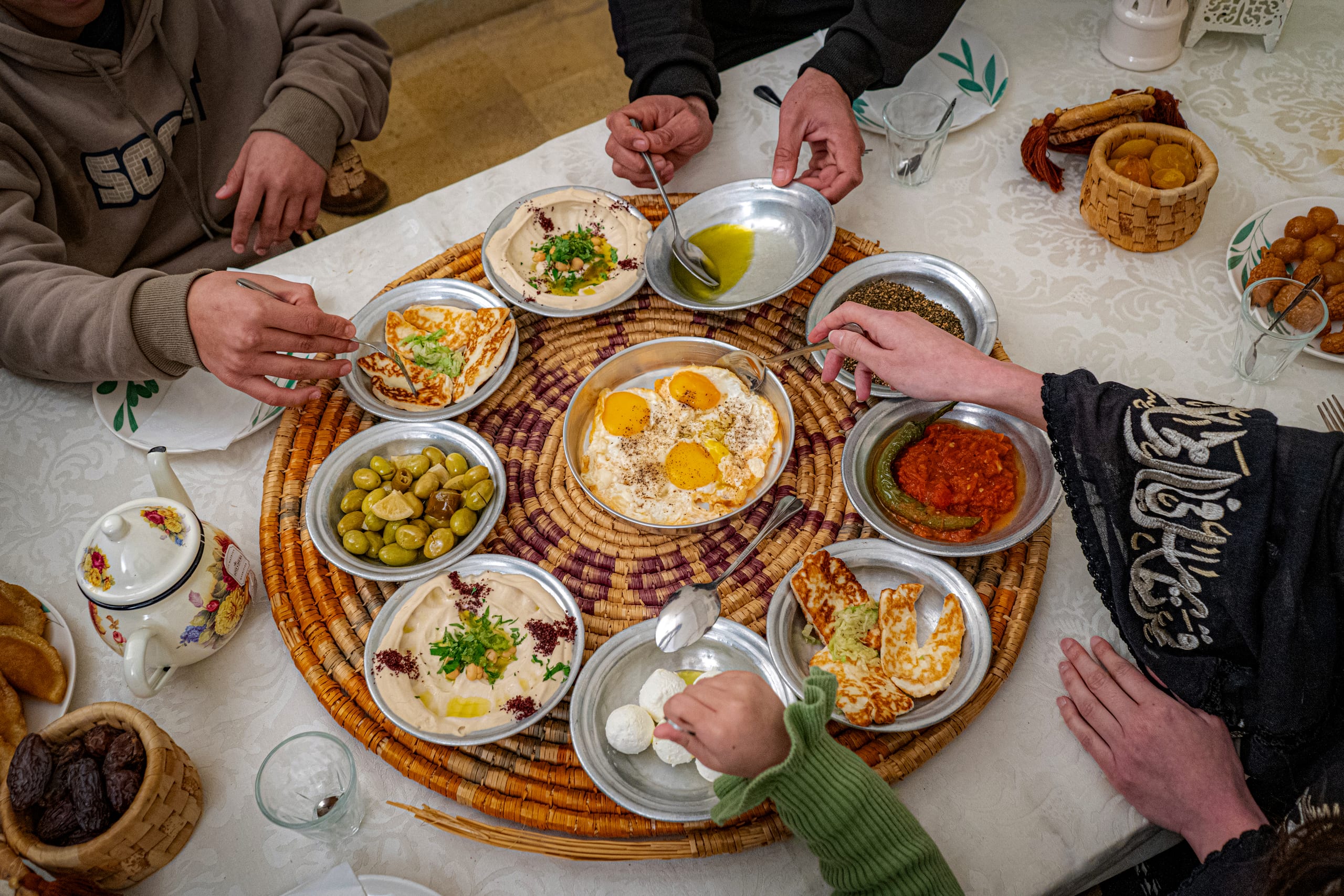 Family Ramadan Eftar Food Eating, a fine-art photograph by Ali Abu Ras